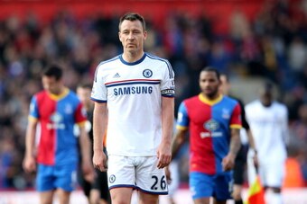 LONDON, ENGLAND - MARCH 29:  A dejected John Terry of Chelsea walks off the pitch following his team's 1-0 defeat during the Barclays Premier League match between Crystal Palace and Chelsea at Selhurst Park on March 29, 2014 in London, England.  (Photo by