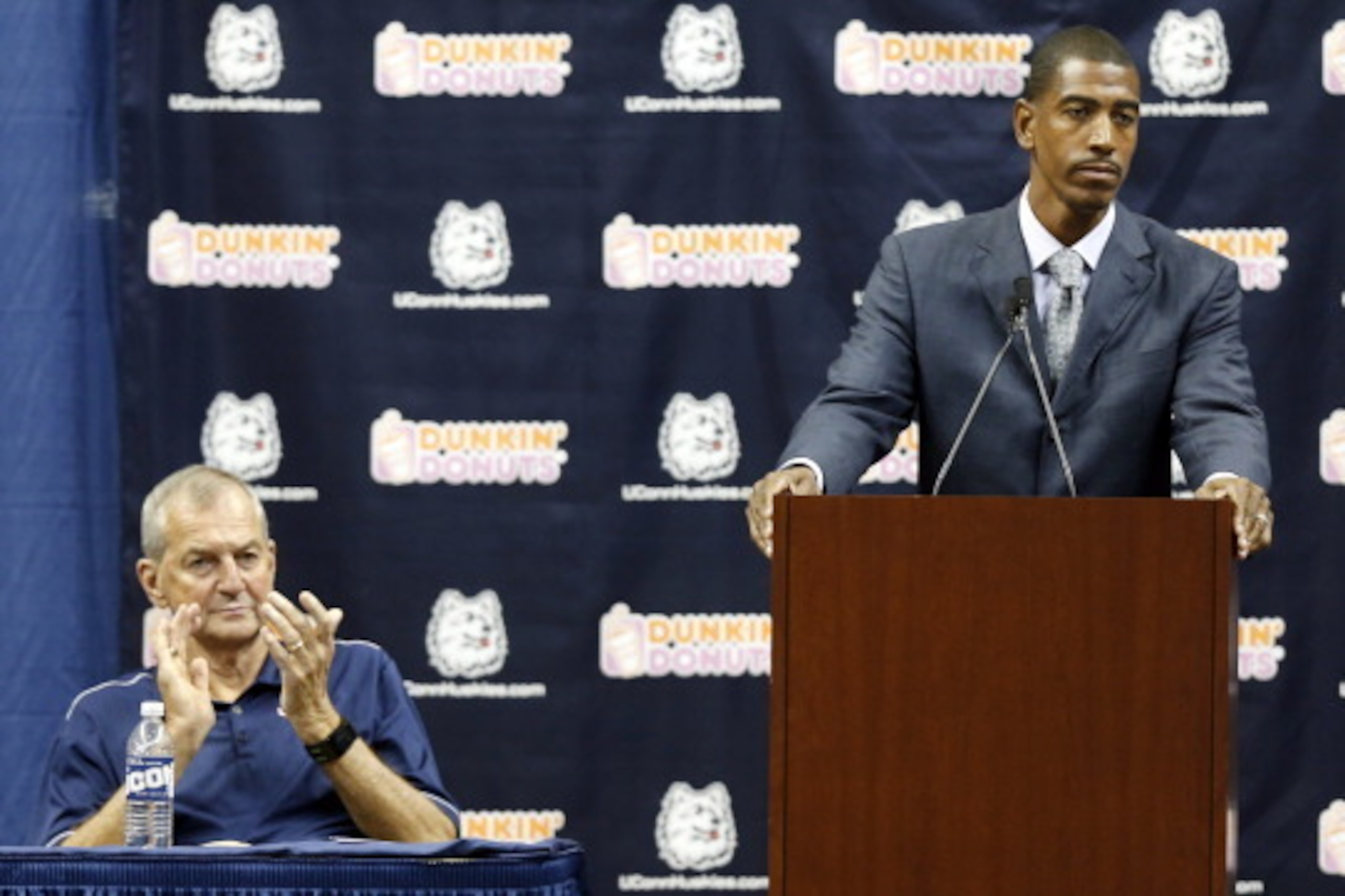 STORRS, CT- SEPTEMBER 13:  Newly named University Of Connecticut basketball coach Kevin Ollie (L) speaks at a news conference basketball coach Jim Calhoun announced his retirement at a news conference on September 13, 2012 in Storrs, Connecticut.  (Photo 