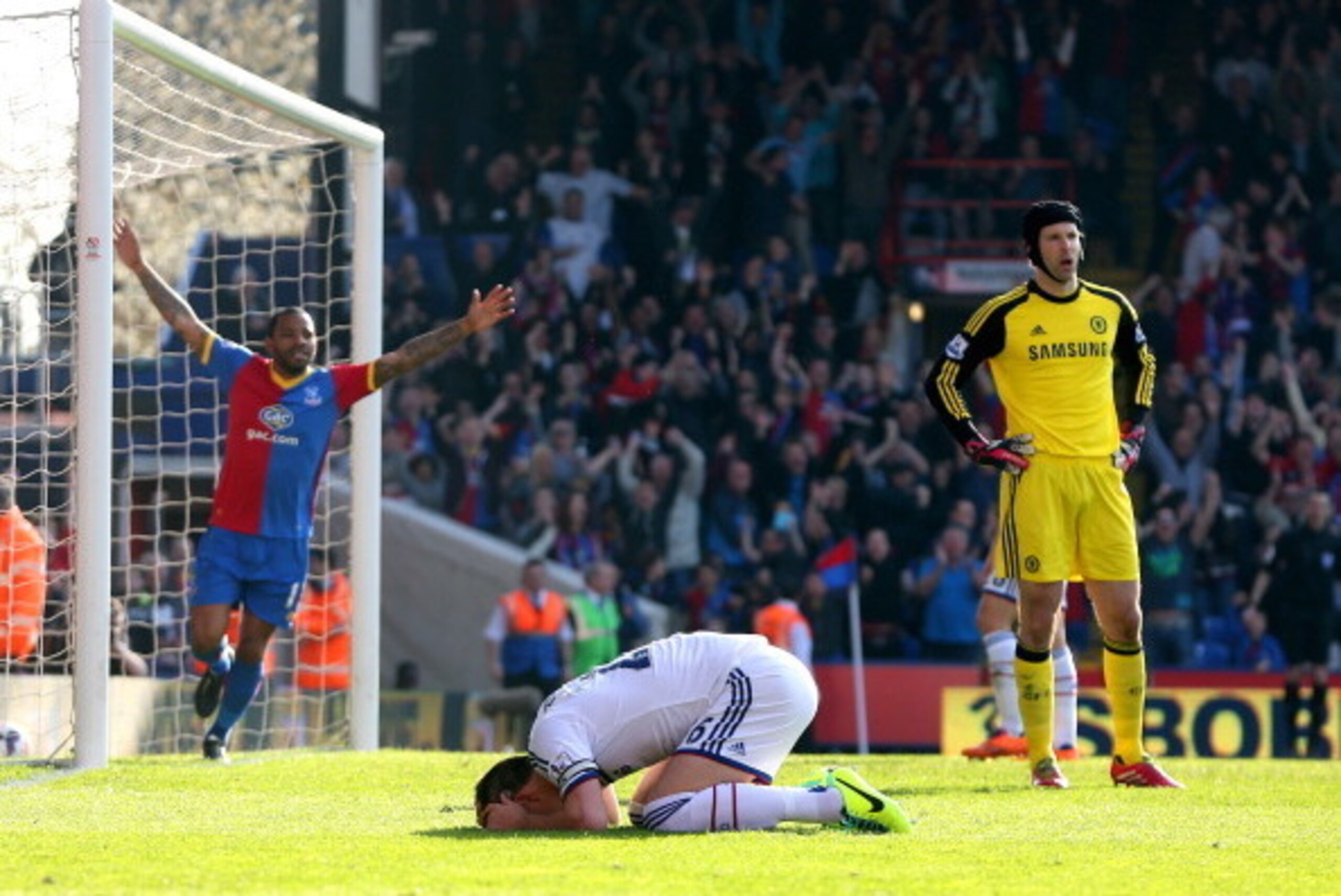 LONDON, ENGLAND - MARCH 29:  A dejected John Terry (C) of Chelsea reacts after opening the scoring with an own goal during the Barclays Premier League match between Crystal Palace and Chelsea at Selhurst Park on March 29, 2014 in London, England.  (Photo 