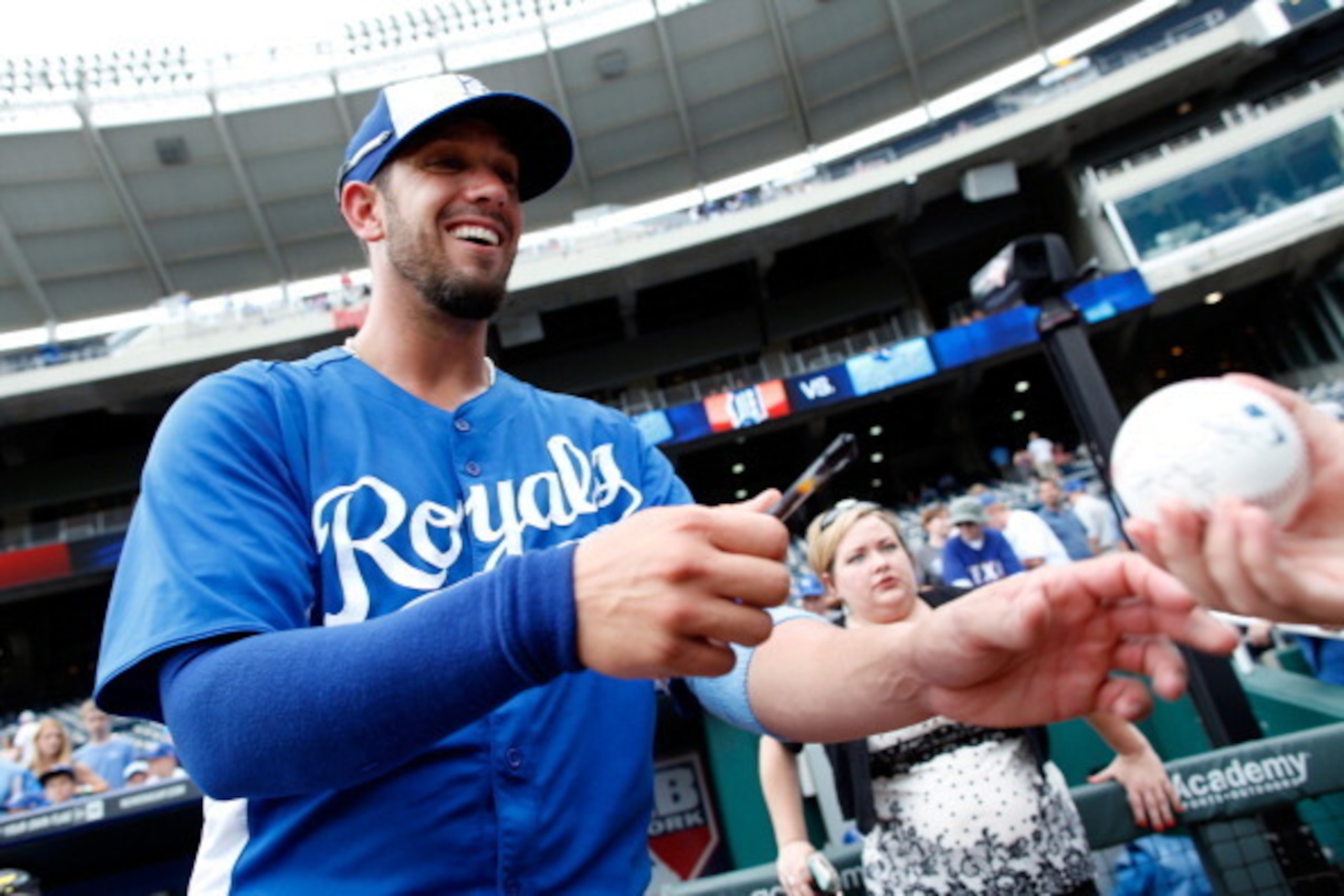 KANSAS CITY, MO - JULY 20:  Pitcher James Shields #33 of the Kansas City Royals signs autographs prior to the game against the Detroit Tigers at Kauffman Stadium on July 20, 2013 in Kansas City, Missouri.  (Photo by Jamie Squire/Getty Images)