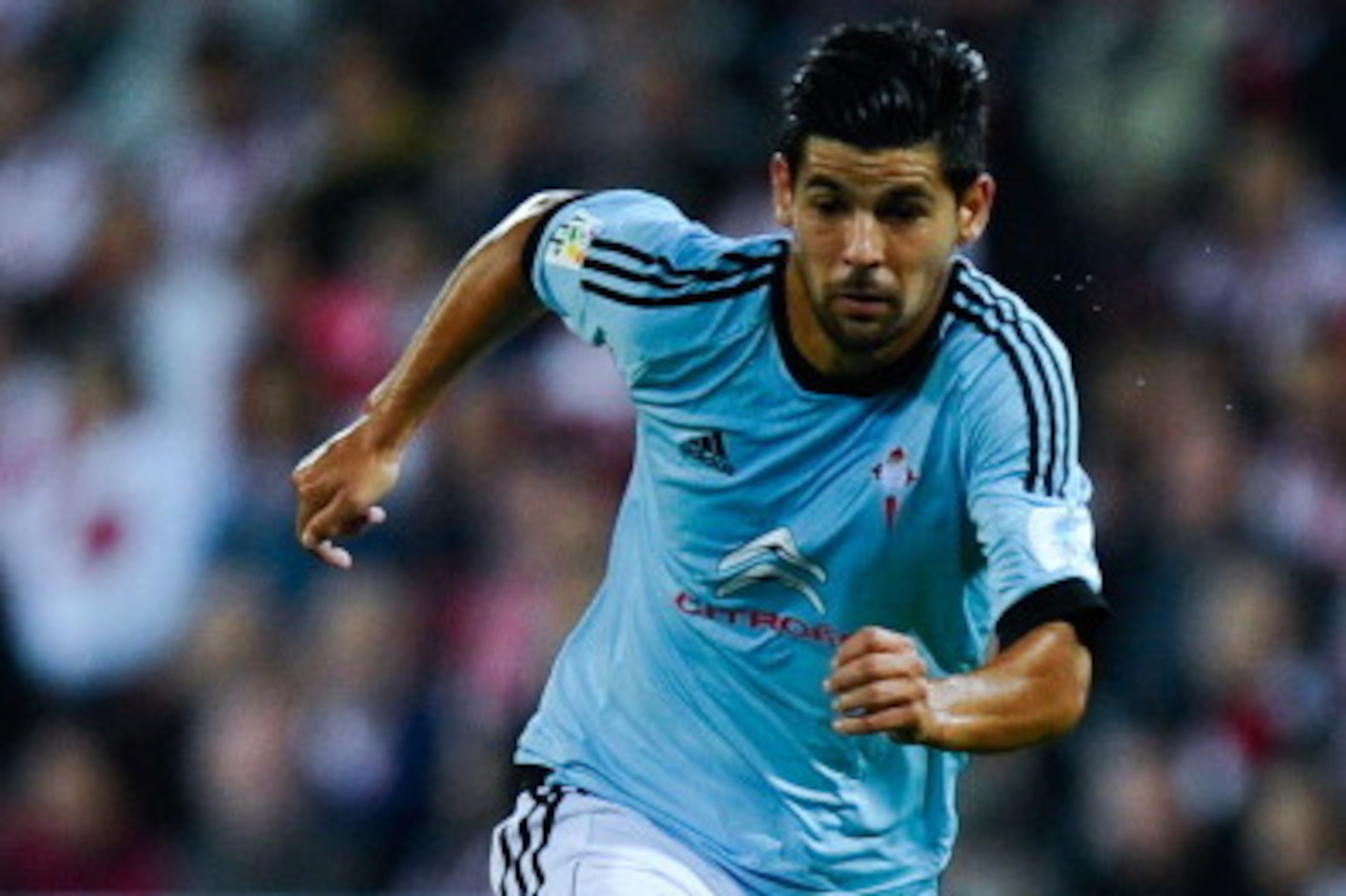 BILBAO, SPAIN - SEPTEMBER 16:  Manuel Agudo 'Nolito' of RC Celta de Vigo runs with the ball during the La Liga match between Athletic Club and RC Celta de Vigo at San Mames Stadium on September 16, 2013 in Bilbao, Spain.  (Photo by David Ramos/Getty Image