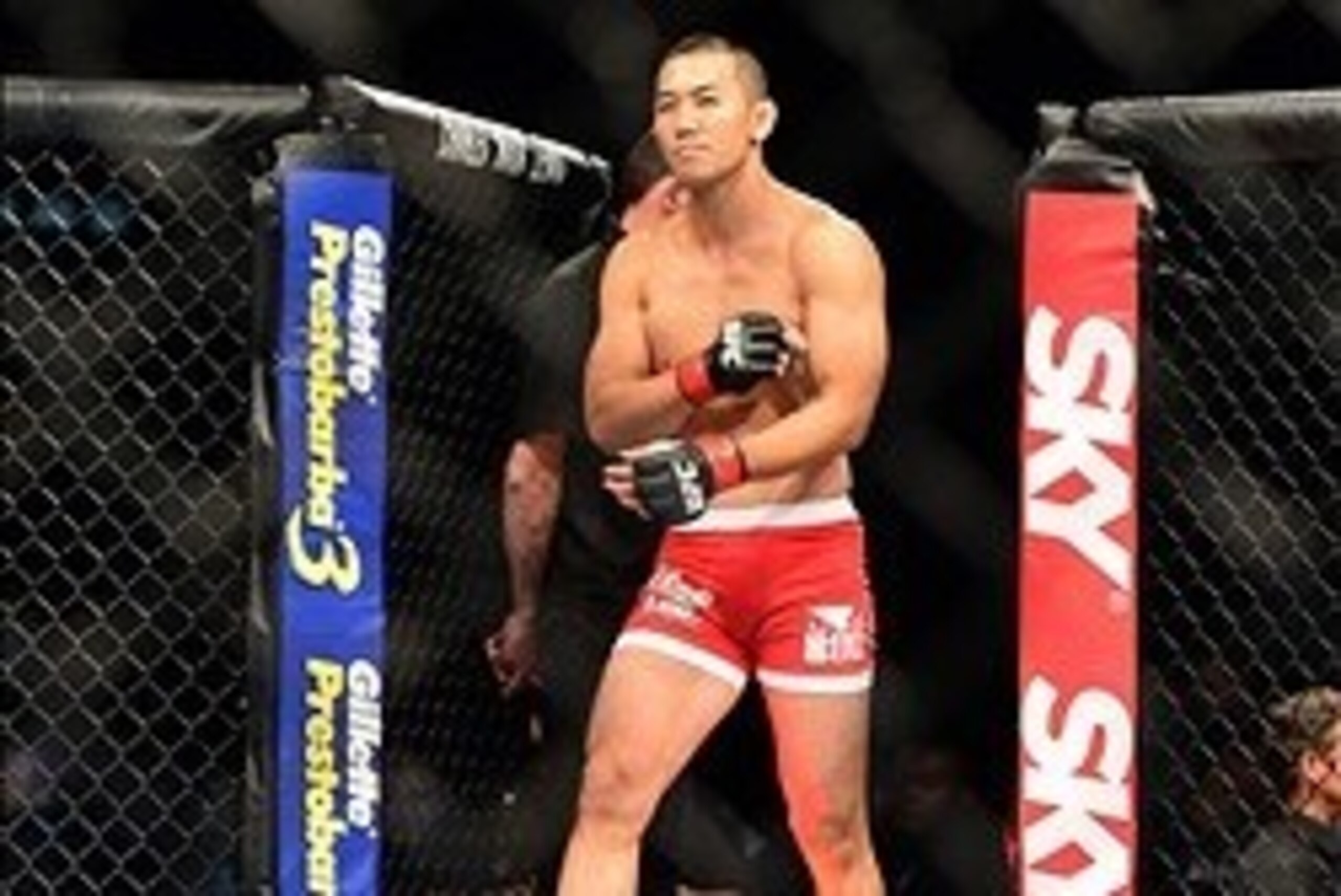 Sep 4, 2013; Belo Horizonte, BRAZIL; Yushin Okami (red shorts) enters his fight against Ronaldo Jacare Souza (not pictured) during UFC Fight Night at Mineirinho Arena. Mandatory Credit: Jason Silva-USA TODAY Sports Sep 4, 2013; Belo Horizonte, BRAZIL; Yushin Okami (red shorts) enters his fight against Ronaldo Jacare Souza (not pictured) during UFC Fight Night at Mineirinho Arena. Mandatory Credit: Jason Silva-USA TODAY Sports