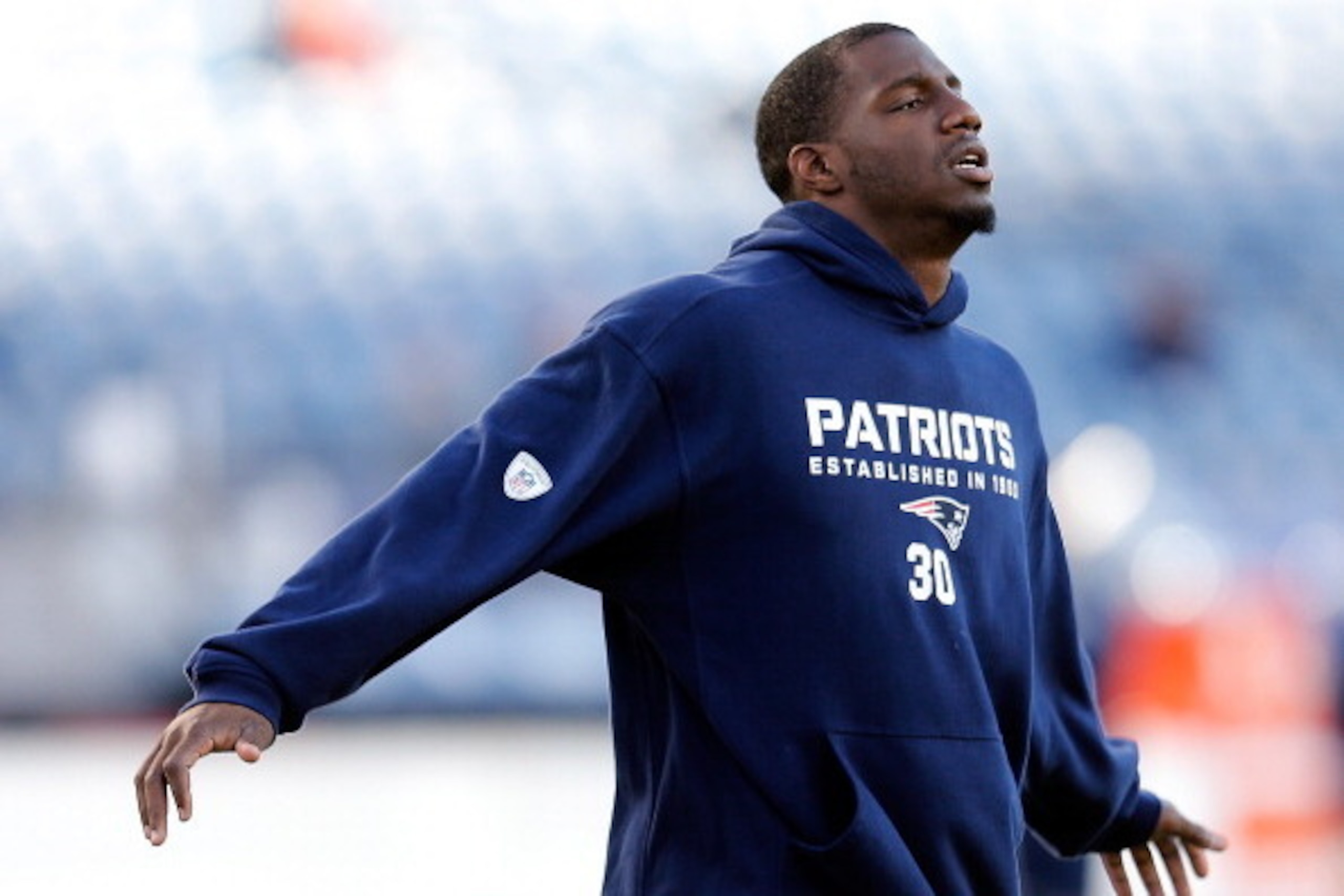 FOXBORO, MA - NOVEMBER 3:  Duron Harmon #30 of the New England Patriots stretches before a game with the Pittsburgh Steelers at Gillette Stadium on November 3, 2013 in Foxboro, Massachusetts. (Photo by Jim Rogash/Getty Images)
