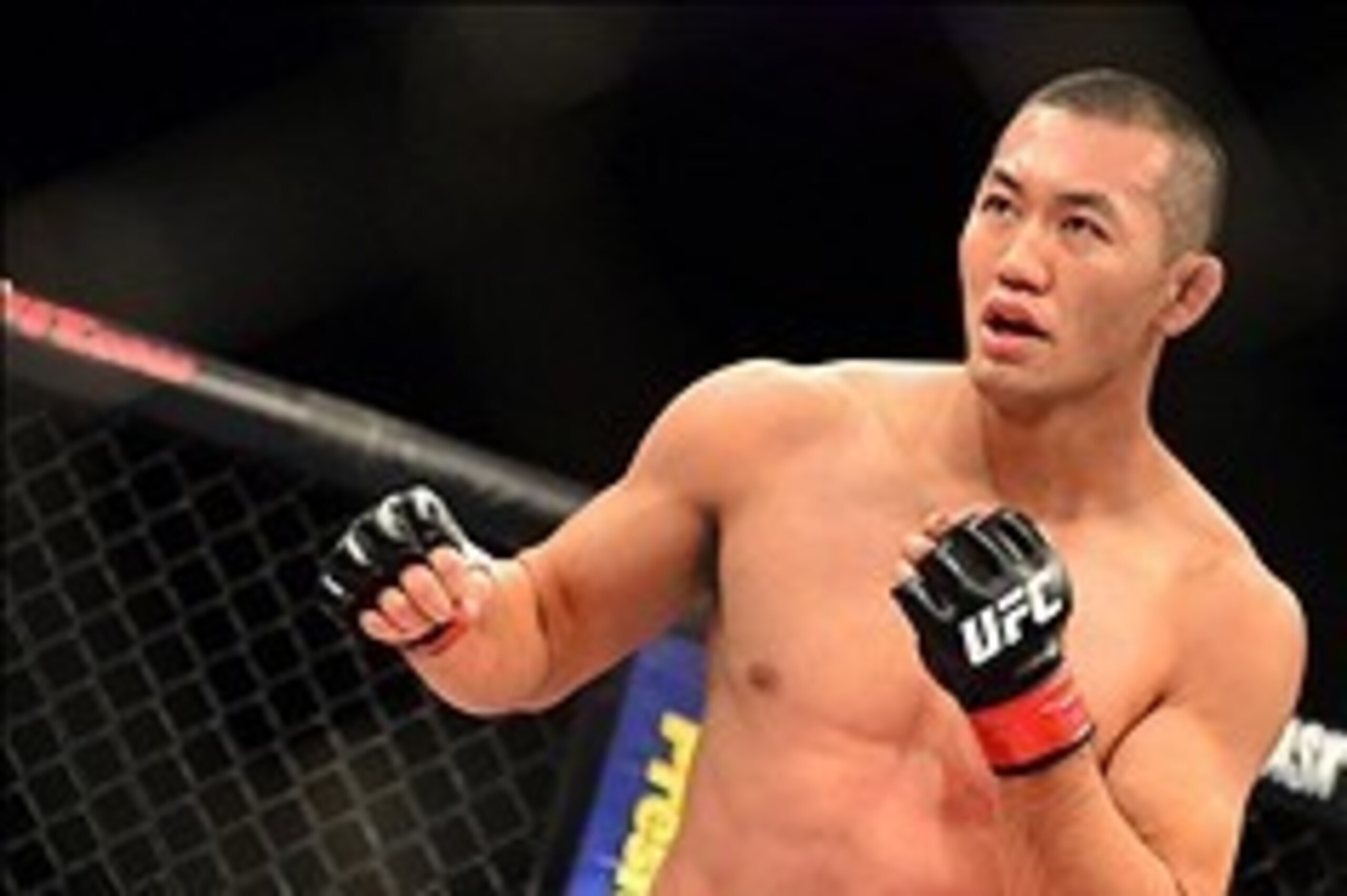 Sep 4, 2013; Belo Horizonte, BRAZIL;  Yushin Okami (red shorts) during his fight against Ronaldo Jacare Souza (not pictured) during UFC Fight Night at Mineirinho Arena. Mandatory Credit: Jason Silva-USA TODAY Sports