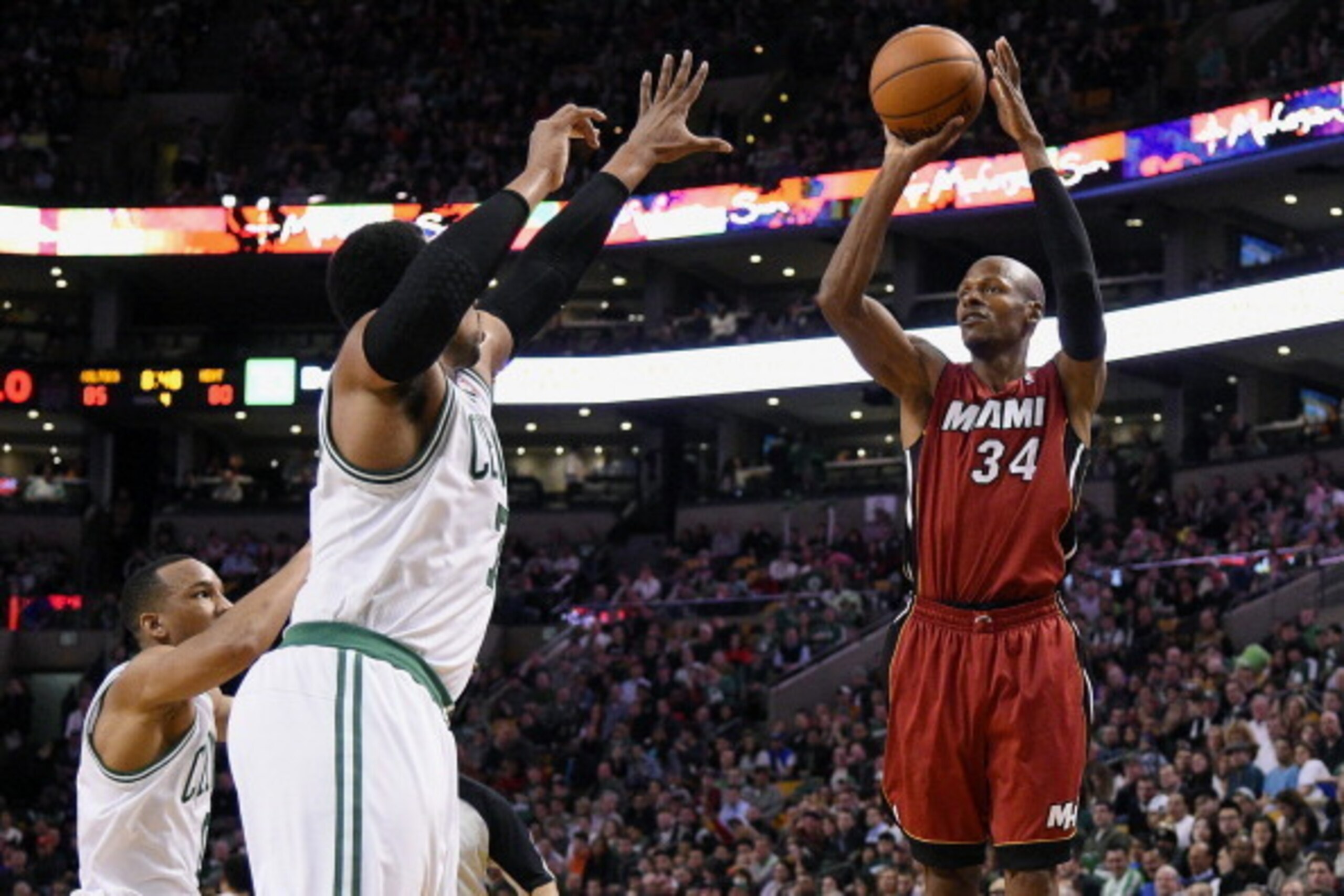 BOSTON, MA - MARCH 19: Ray Allen #34 of the Miami Heat shoots against Jared Sullinger #7 of the Boston Celtics on March 19, 2014 at the TD Garden in Boston, Massachusetts.  NOTE TO USER: User expressly acknowledges and agrees that, by downloading and or u