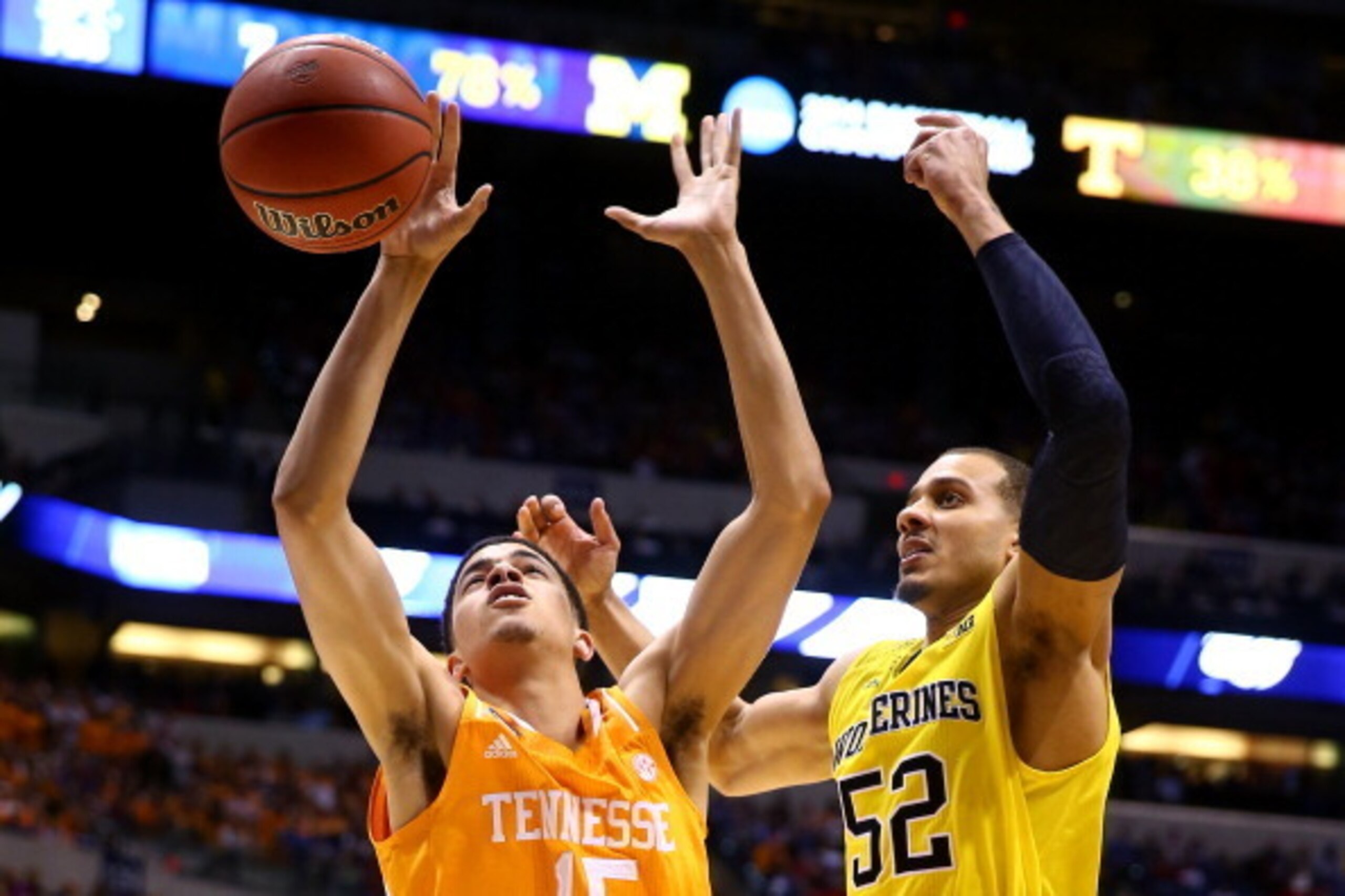 INDIANAPOLIS, IN - MARCH 28:  Jordan Morgan #52 of the Michigan Wolverines in action against the Tennessee Volunteers during the regional semifinal of the 2014 NCAA Men's Basketball Tournament at Lucas Oil Stadium on March 28, 2014 in Indianapolis, Indian