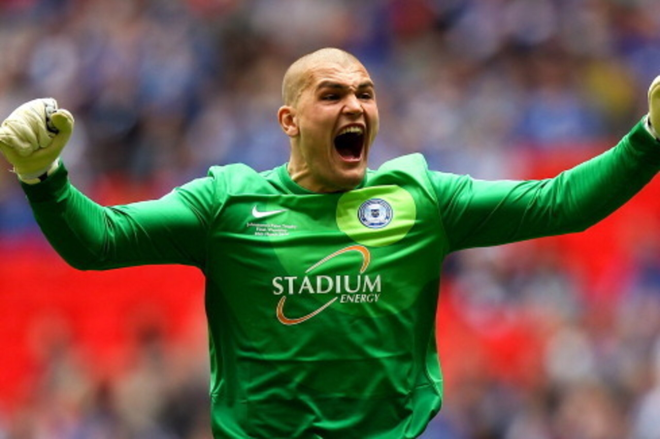 LONDON, ENGLAND - MARCH 30:  Bobby Olejnik of Peterborough celebrates after his team mate Josh Mcquoid scored the opening goal of the game during the Johnstone's Paint Trophy Final between Chesterfield and Peterborough United at Wembley Stadium on March 3