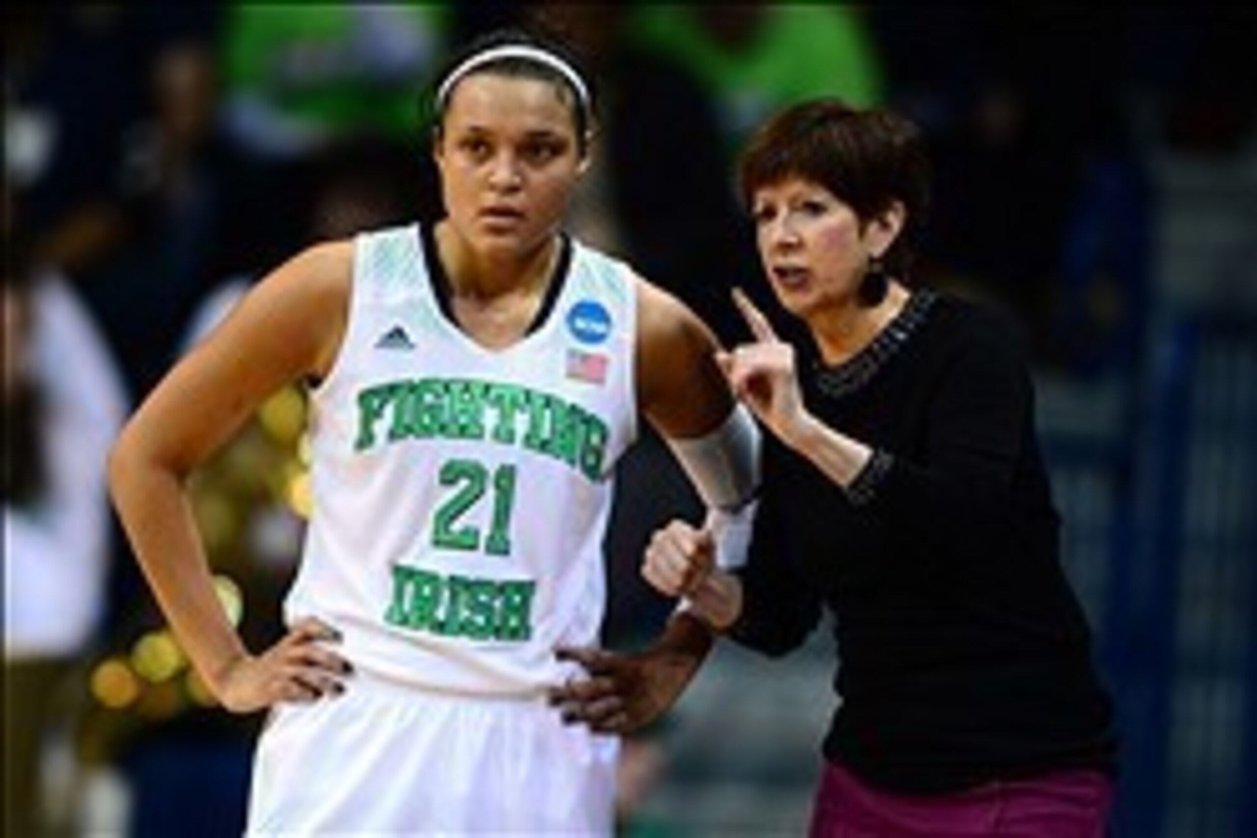 Mar 22, 2014; Toledo, OH, USA; Notre Dame Fighting Irish head coach Muffet McGraw talks with guard Kayla McBride (21) against the Robert Morris Colonials in the first half of a women's college basketball game in the first round of the NCAA Tournament at S Mar 22, 2014; Toledo, OH, USA; Notre Dame Fighting Irish head coach Muffet McGraw talks with guard Kayla McBride (21) against the Robert Morris Colonials in the first half of a women's college basketball game in the first round of the NCAA Tournament at S