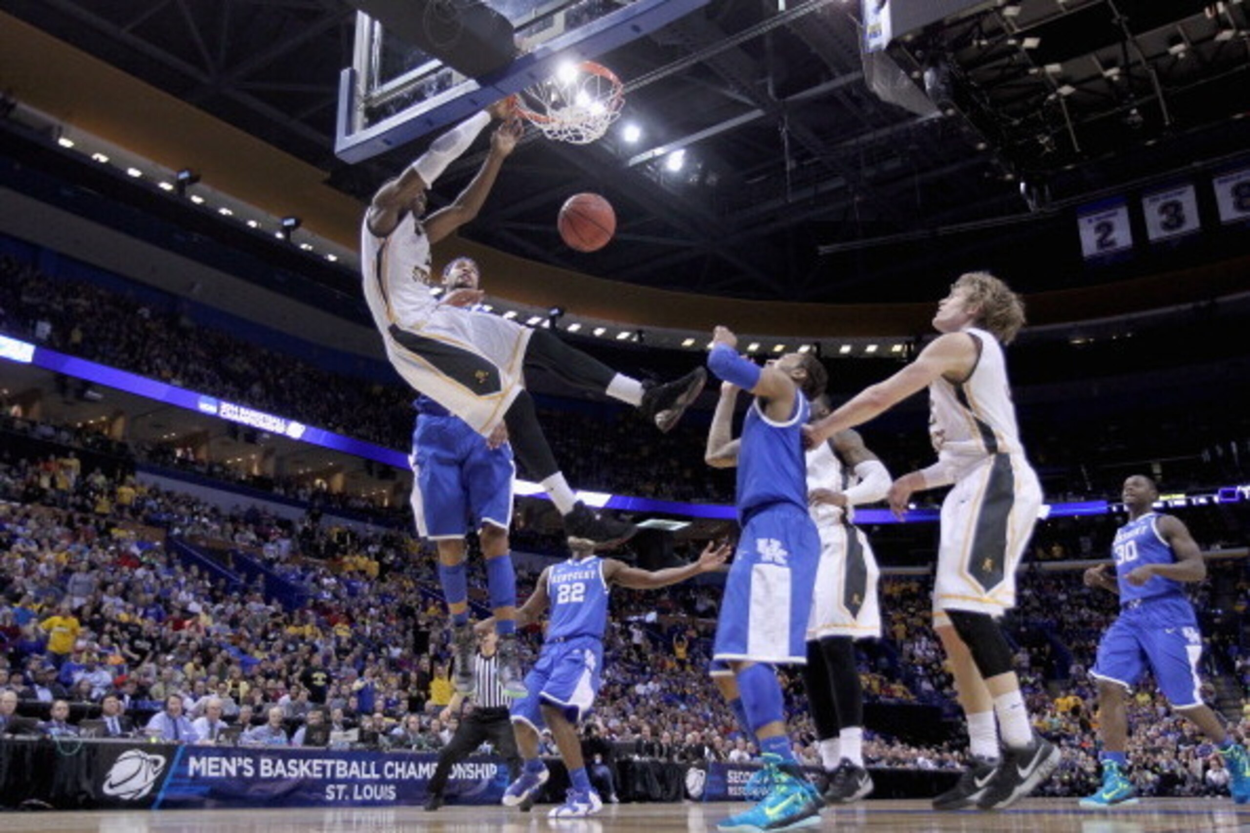 ST LOUIS, MO - MARCH 23:  Cleanthony Early #11 of the Wichita State Shockers shoots the ball against the Kentucky Wildcats during the third round of the 2014 NCAA Men's Basketball Tournament at Scottrade Center on March 23, 2014 in St Louis, Missouri.  (P