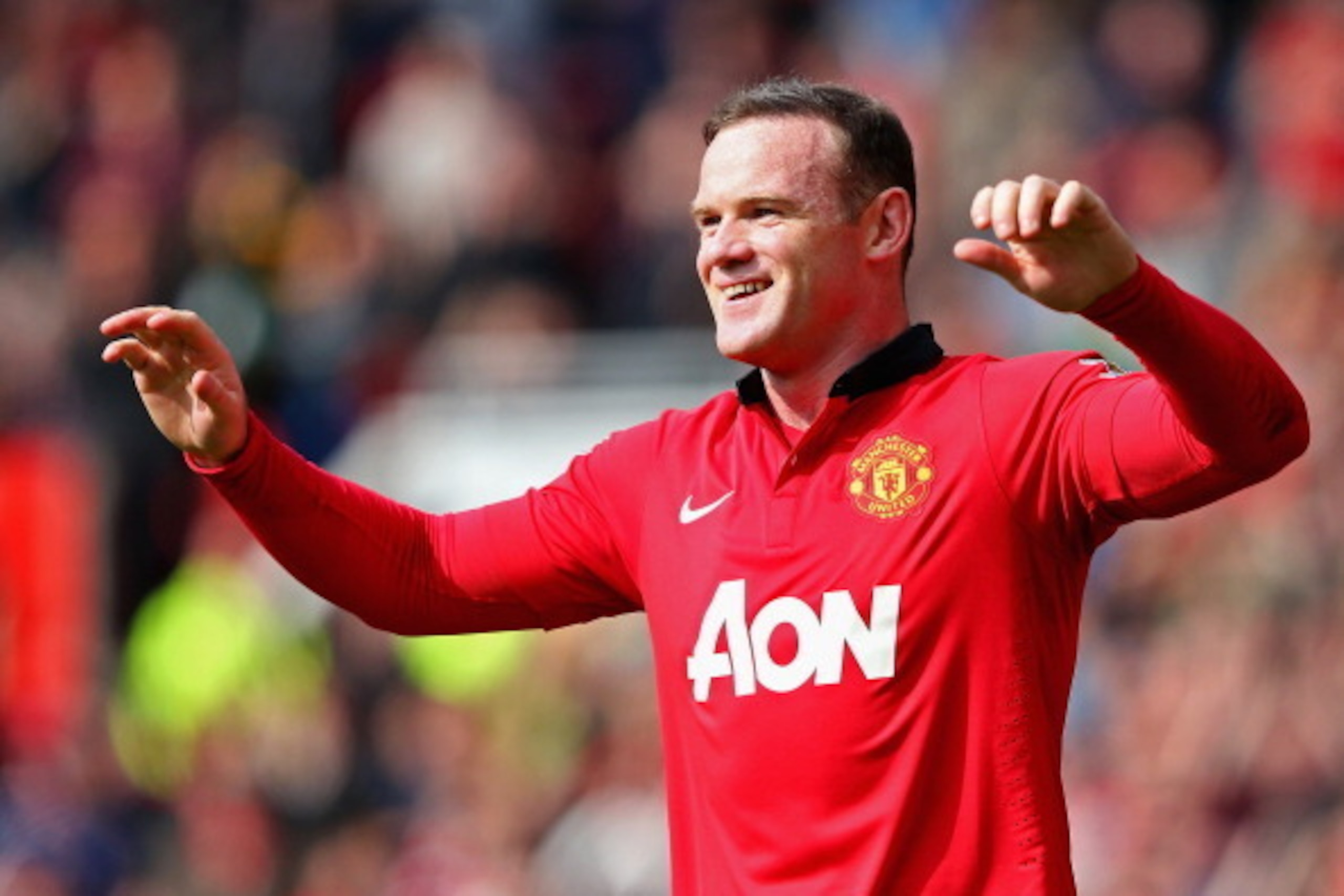 MANCHESTER, ENGLAND - MARCH 29:  Wayne Rooney of Manchester United celebrates scoring his team's second goal from a penalty kick during the Barclays Premier League match between Manchester United and Aston Villa at Old Trafford on March 29, 2014 in Manche