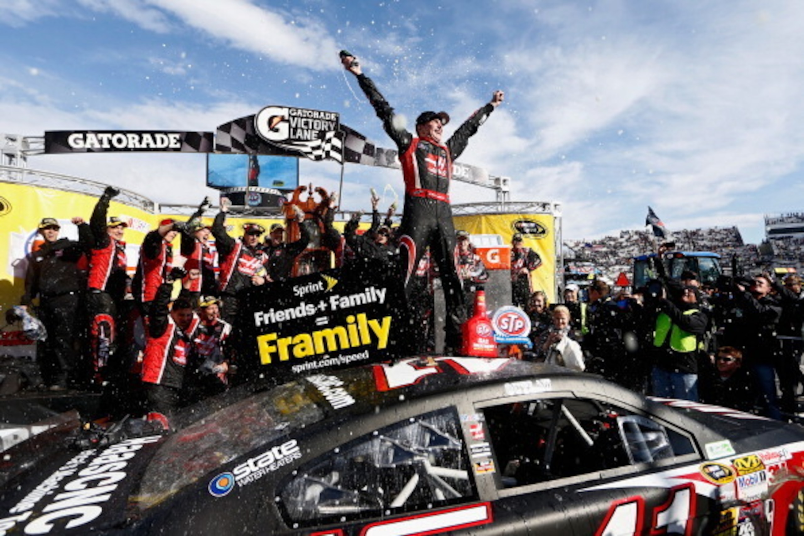 MARTINSVILLE, VA - MARCH 30:  Kurt Busch, driver of the #41 Haas Automation Chevrolet, celebrates in Victory Lane after winning the NASCAR Sprint Cup Series STP 500 at Martinsville Speedway on March 30, 2014 in Martinsville, Virginia.  (Photo by Jeff Zele
