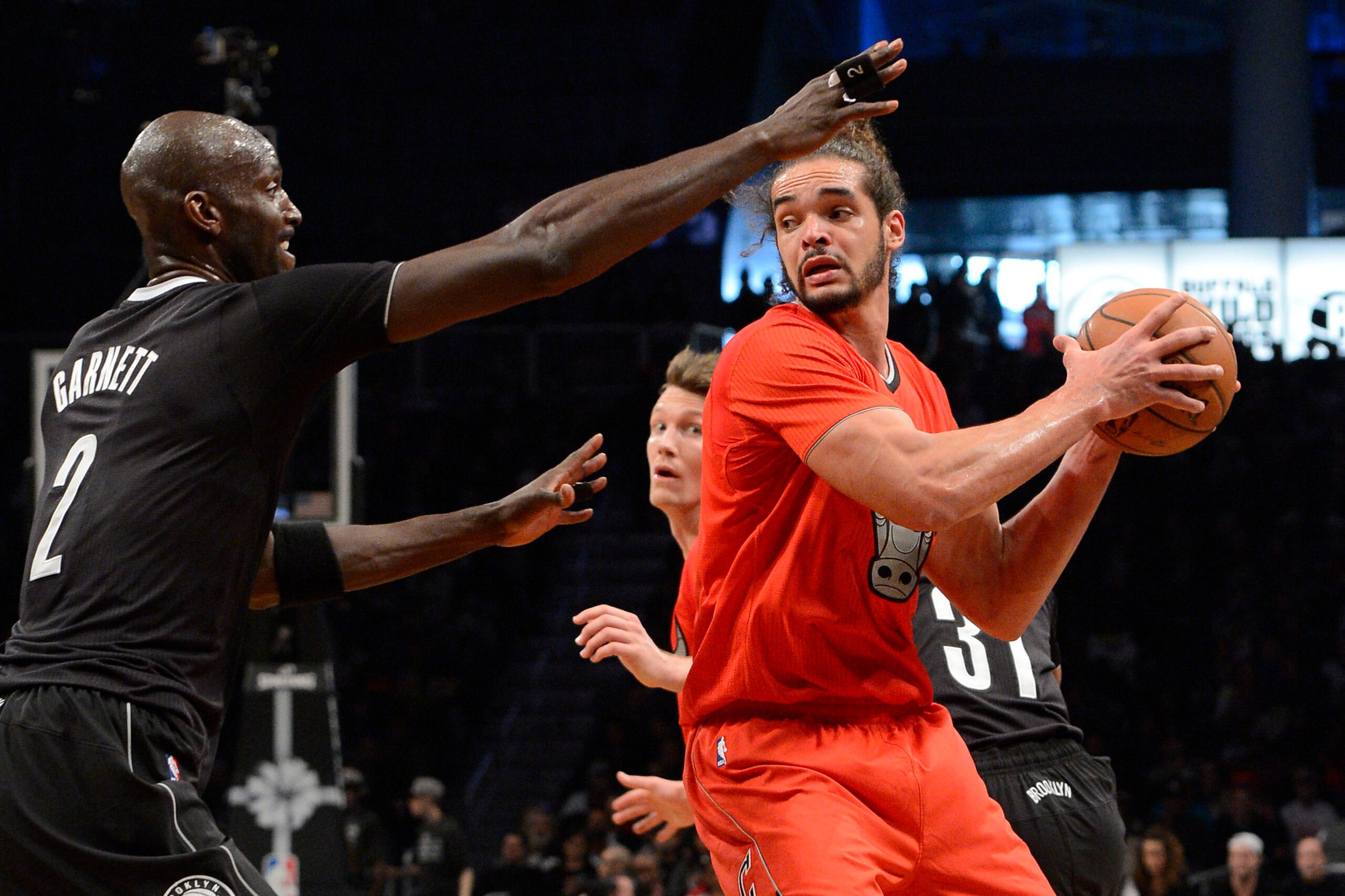 NEW YORK, NY - DECEMBER 25:  Joakim Noah #13 of the Chicago Bulls is defended by Kevin Garnett #2 of the Brooklyn Nets during the second quarter at the Barclays Center on December 25, 2013 in the Brooklyn borough of New York City. NOTE TO USER: User expre