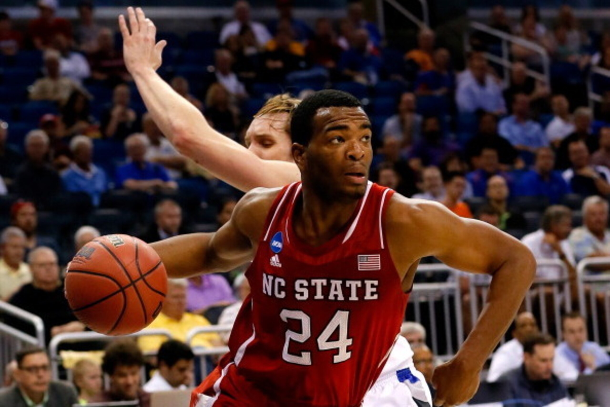 ORLANDO, FL - MARCH 20:  T.J. Warren #24 of the North Carolina State Wolfpack drives to the basket against Jake Barnett #30 of the Saint Louis Billikens during the second round of the 2014 NCAA Men's Basketball Tournament at Amway Center on March 20, 2014