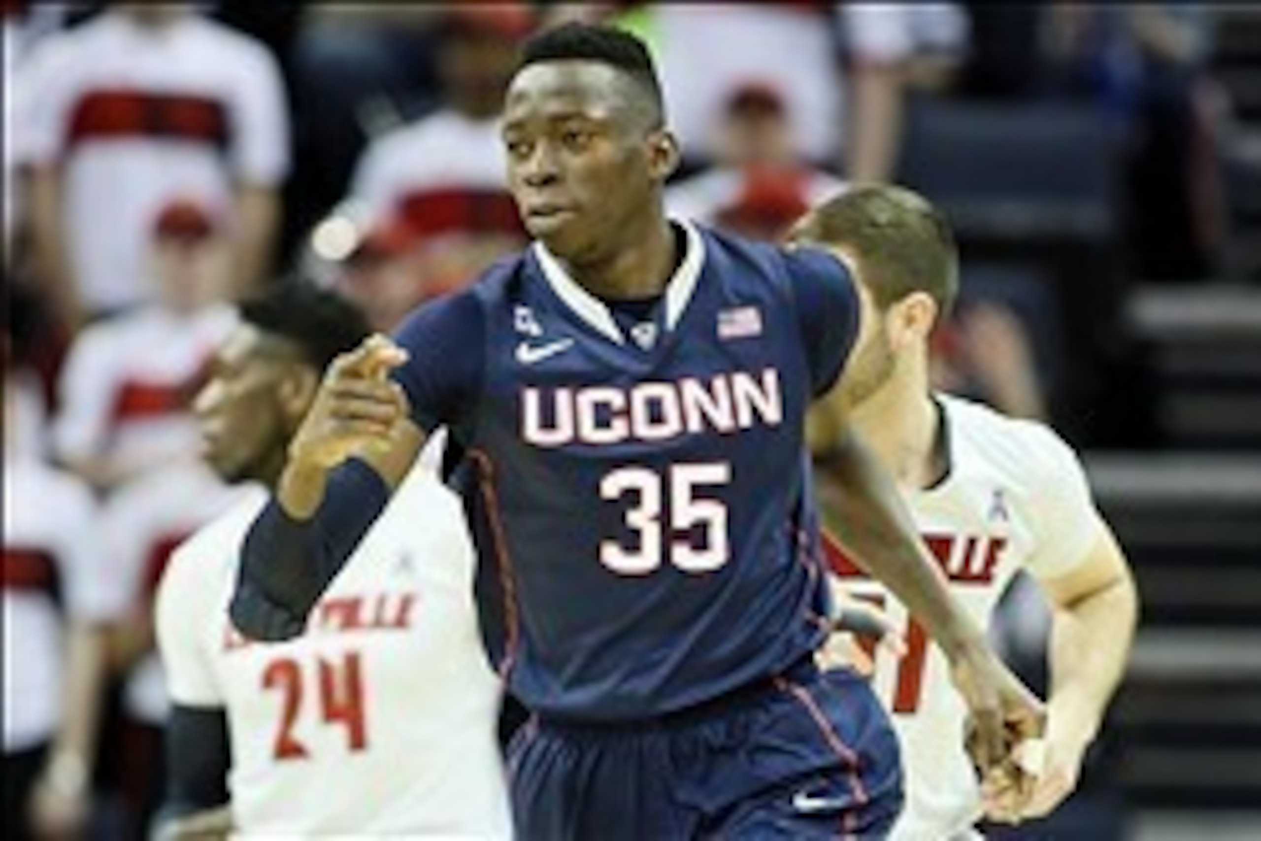 Mar 15, 2014; Memphis, TN, USA; Connecticut Huskies center Amida Brimah (35) celebrates after scoring during the first half against the Louisville Cardinals in final of the American Athletic Conference college basketball tournament at FedEx Forum. Mandato Mar 15, 2014; Memphis, TN, USA; Connecticut Huskies center Amida Brimah (35) celebrates after scoring during the first half against the Louisville Cardinals in final of the American Athletic Conference college basketball tournament at FedEx Forum. Mandato