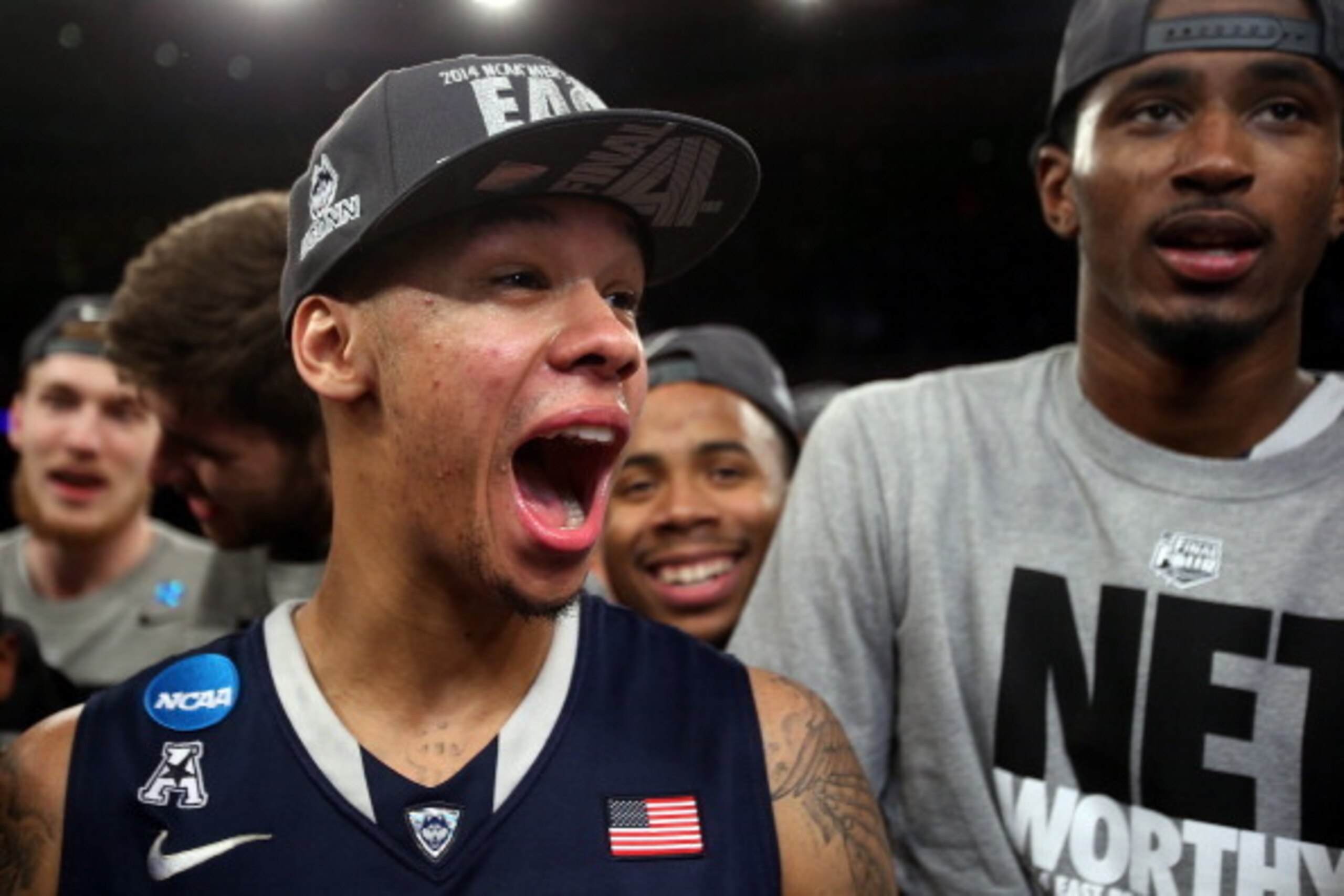 NEW YORK, NY - MARCH 30:  Shabazz Napier #13 of the Connecticut Huskies celebrates after defeating the Michigan State Spartans to win the East Regional Final of the 2014 NCAA Men's Basketball Tournament at Madison Square Garden on March 30, 2014 in New Yo