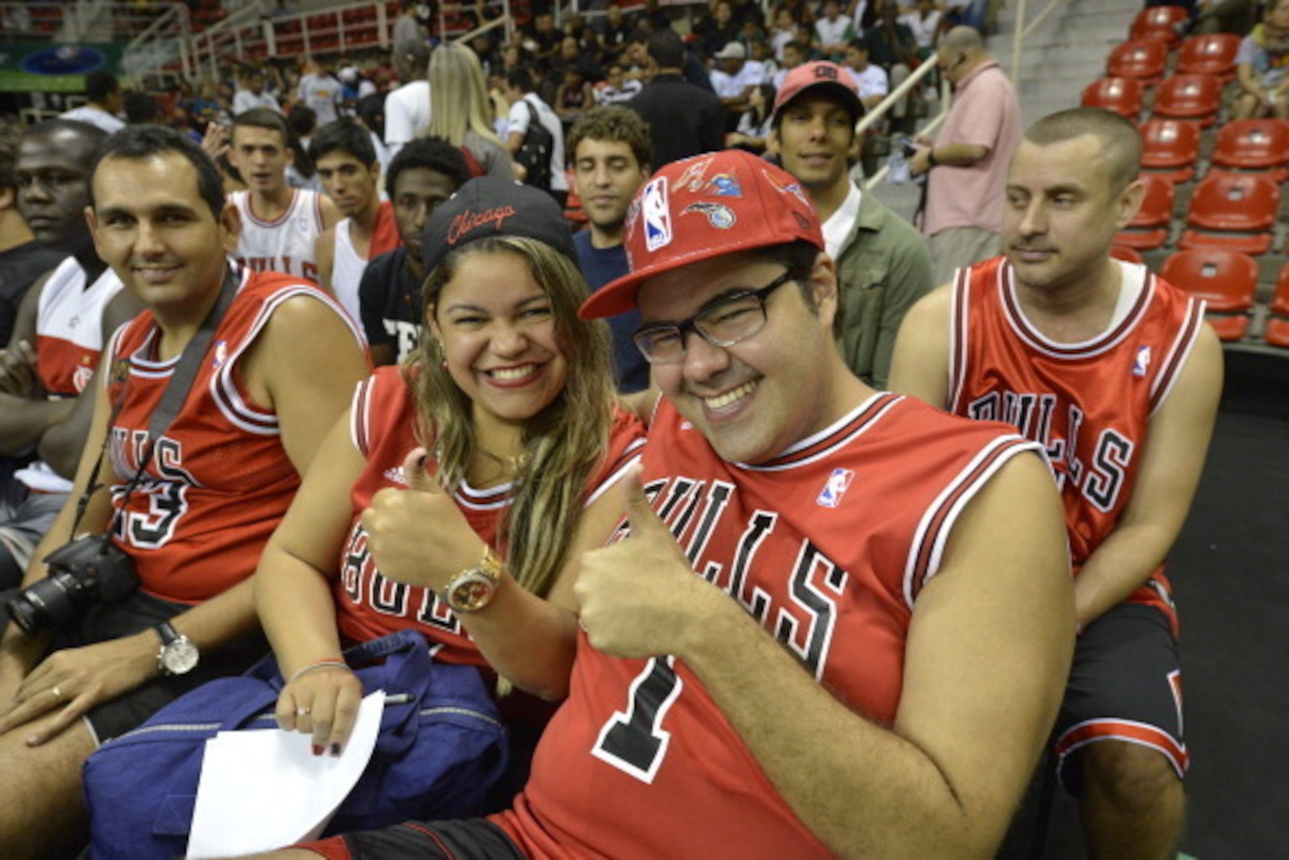 RIO DE JANIERO, BRAZIL - OCTOBER 10: Chicago Bulls fans pose for a photo during Fan Appreciation Day as part of 2013 Global Games on October 10, 2013 at HSBC Arena in Rio de Janiero, Brazil. NOTE TO USER: User expressly acknowledges and agrees that, by do