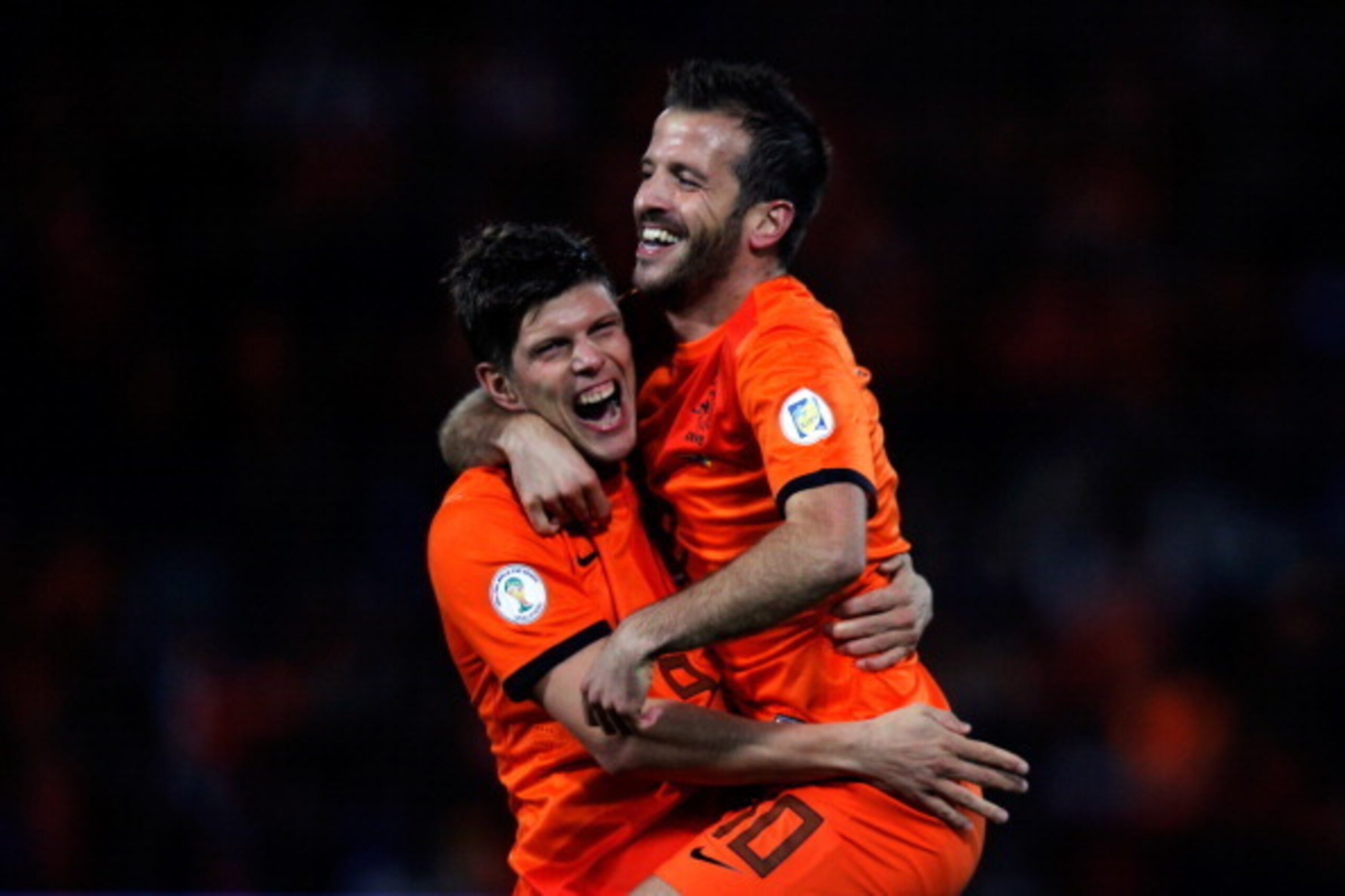 ROTTERDAM, NETHERLANDS - OCTOBER 12:  Rafael Van der Vaart (R) of Netherlands celebrates with team mate Klaas-Jan Huntelaar after scoring the first goal of the game during the FIFA 2014 World Cup Qualifier between Netherlands and Andorra on October 12, 20