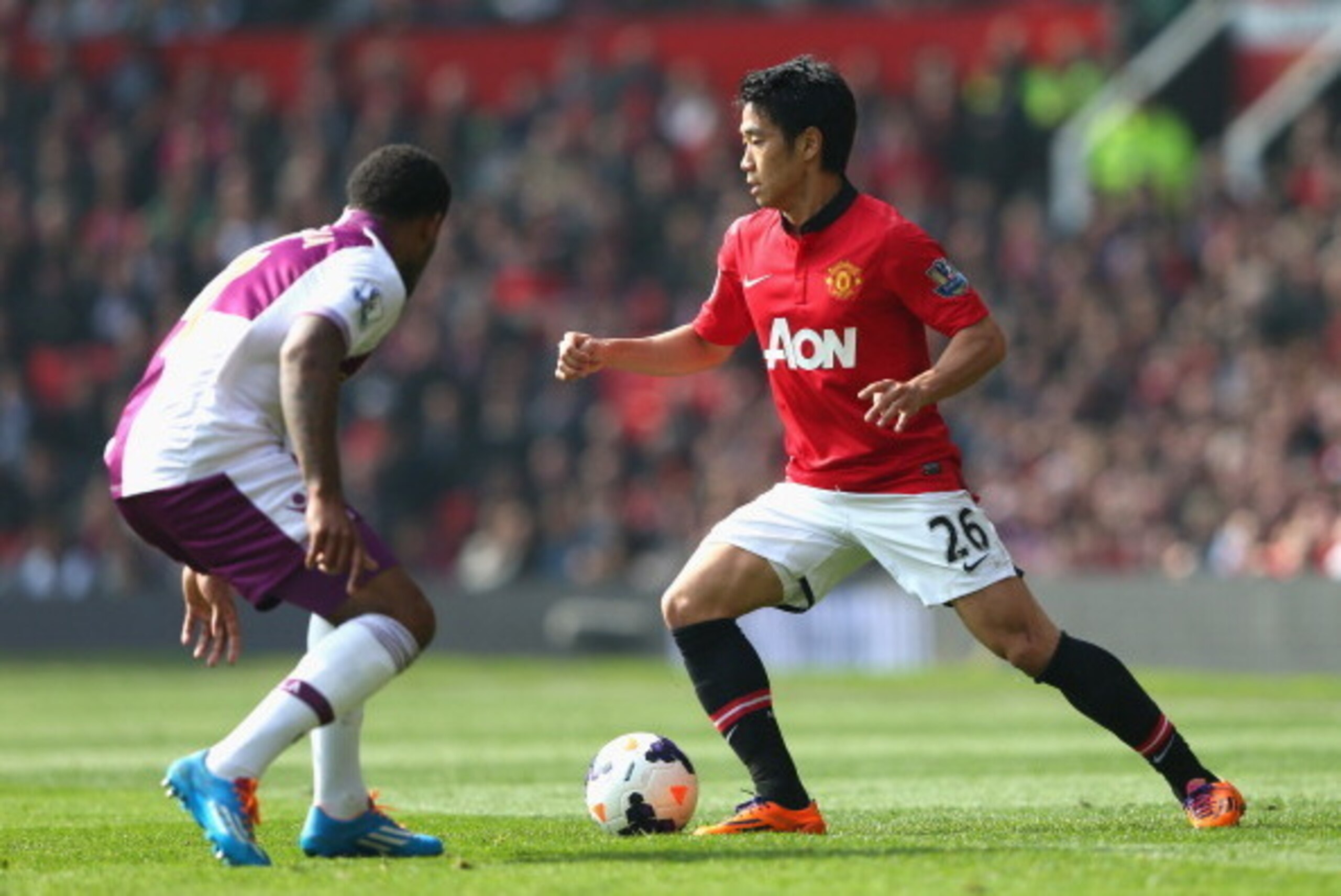 MANCHESTER, ENGLAND - MARCH 29:  Shinji Kagawa of Manchester United in action during the Barclays Premier League match between Manchester United and Aston Villa at Old Trafford on March 29, 2014 in Manchester, England.  (Photo by Alex Livesey/Getty Images
