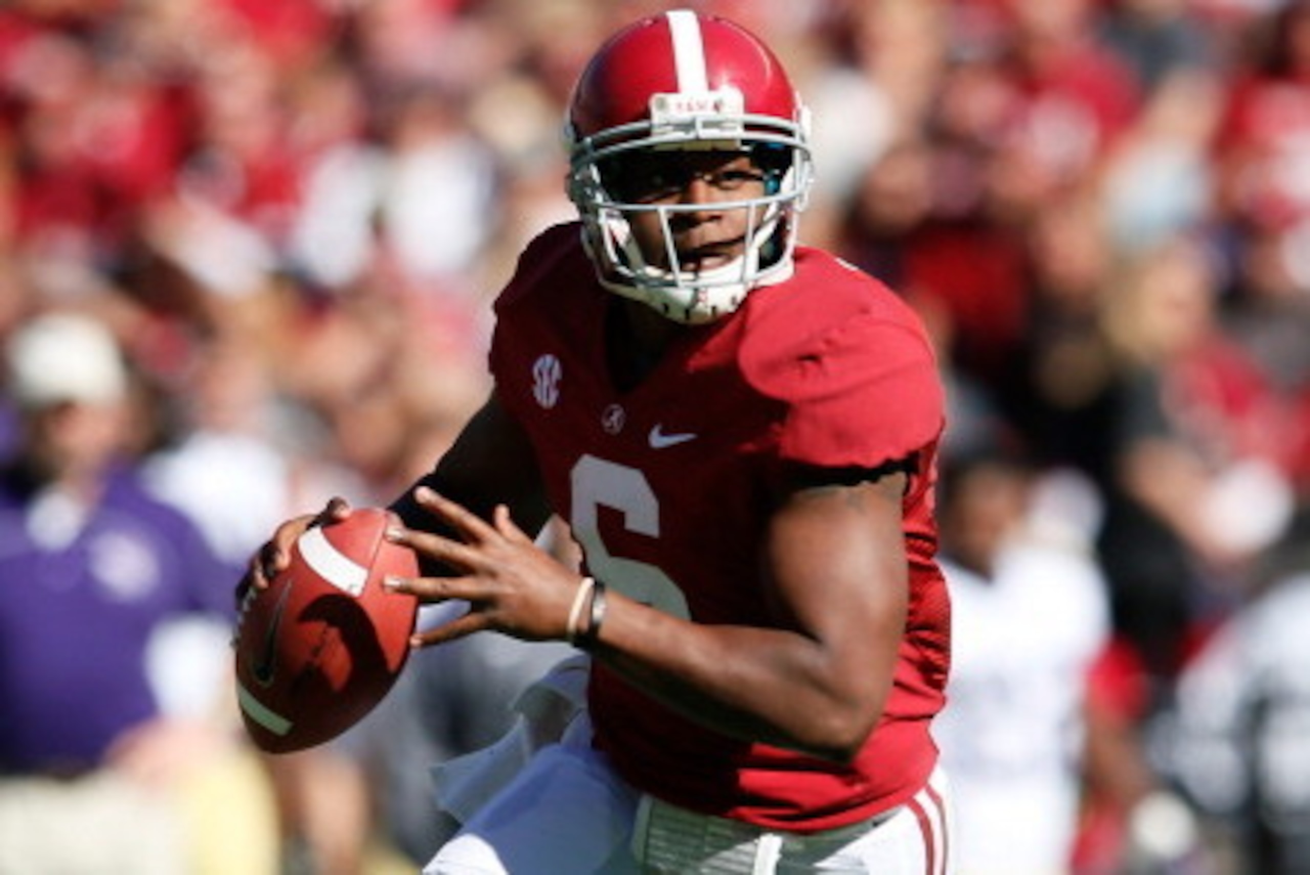 TUSCALOOSA, AL - NOVEMBER 17:  Blake Sims #6 of the Alabama Crimson Tide rolls out of the pocket against the Western Carolina Catamounts at Bryant-Denny Stadium on November 17, 2012 in Tuscaloosa, Alabama.  (Photo by Kevin C. Cox/Getty Images)
