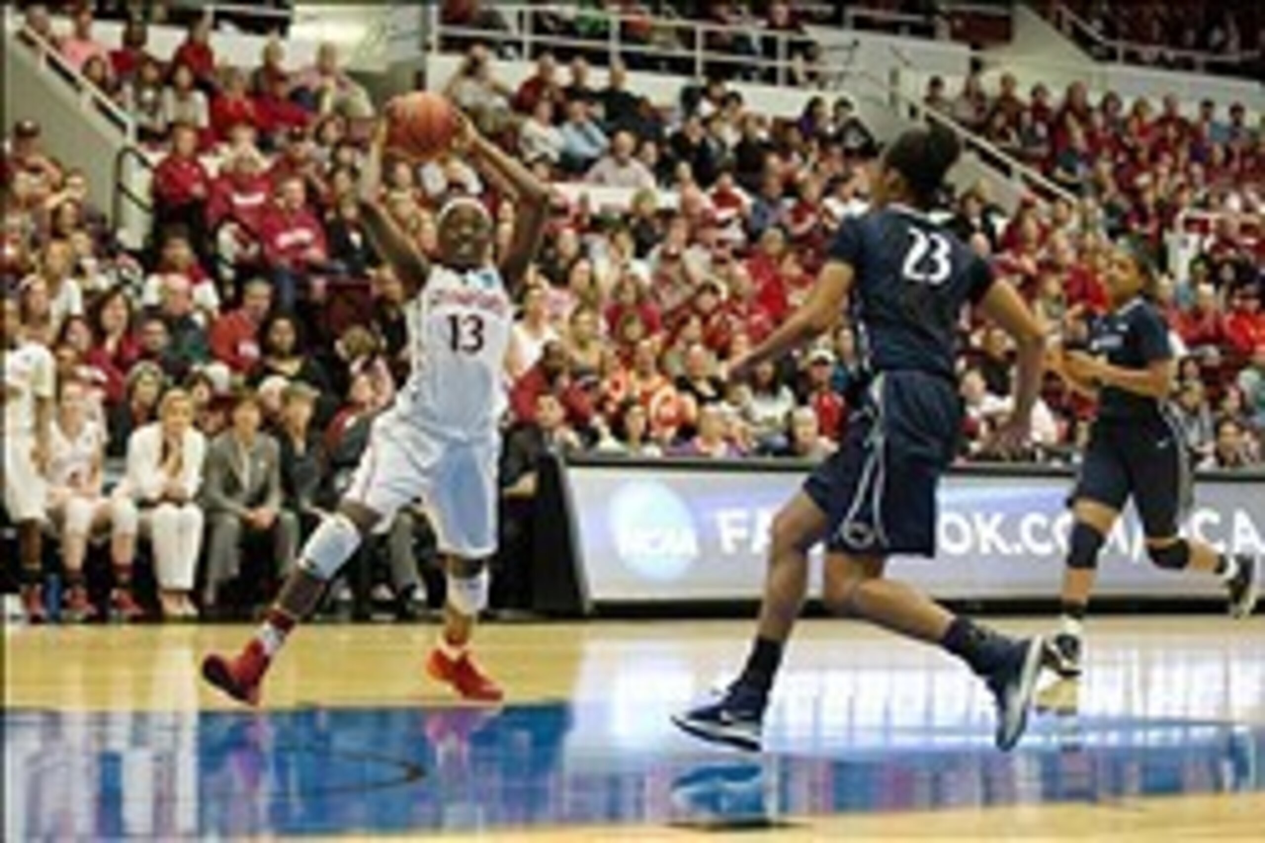Mar 30, 2014; Stanford, CA, USA; Stanford Cardinal forward Chiney Ogwumike (13) drives in against Penn State Lady Lions forward Ariel Edwards (23) during the second half in the semifinals of a women's college basketball game in the Stanford regional of th