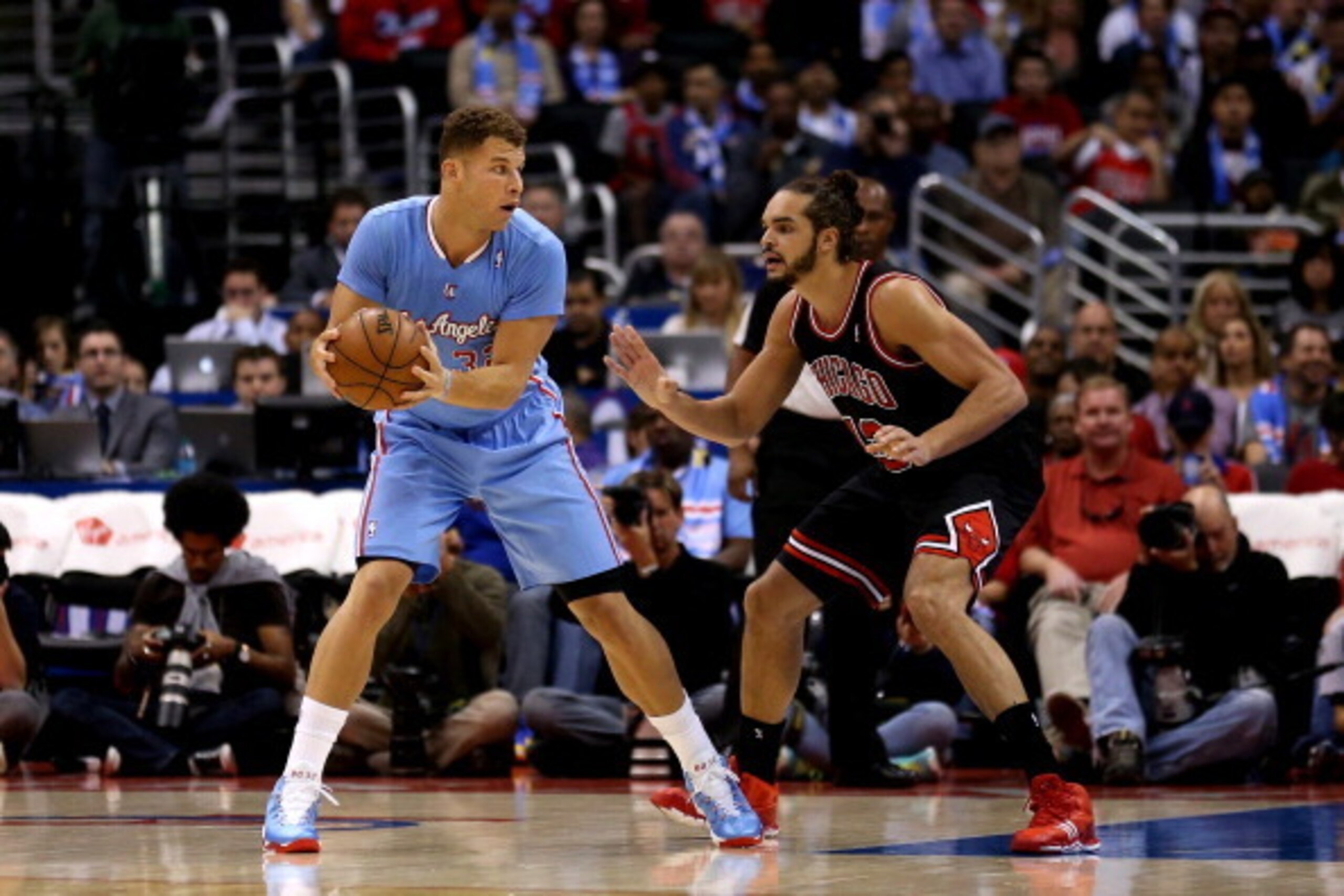 LOS ANGELES, CA - NOVEMBER 24:  Blake Griffin #32 of the Los Angeles Clippers controls the ball against Joakim Noah #13 of the Chicago Bulls at Staples Center on November 24, 2013 in Los Angeles, California.  The Clippers won 121-82.   NOTE TO USER: User 