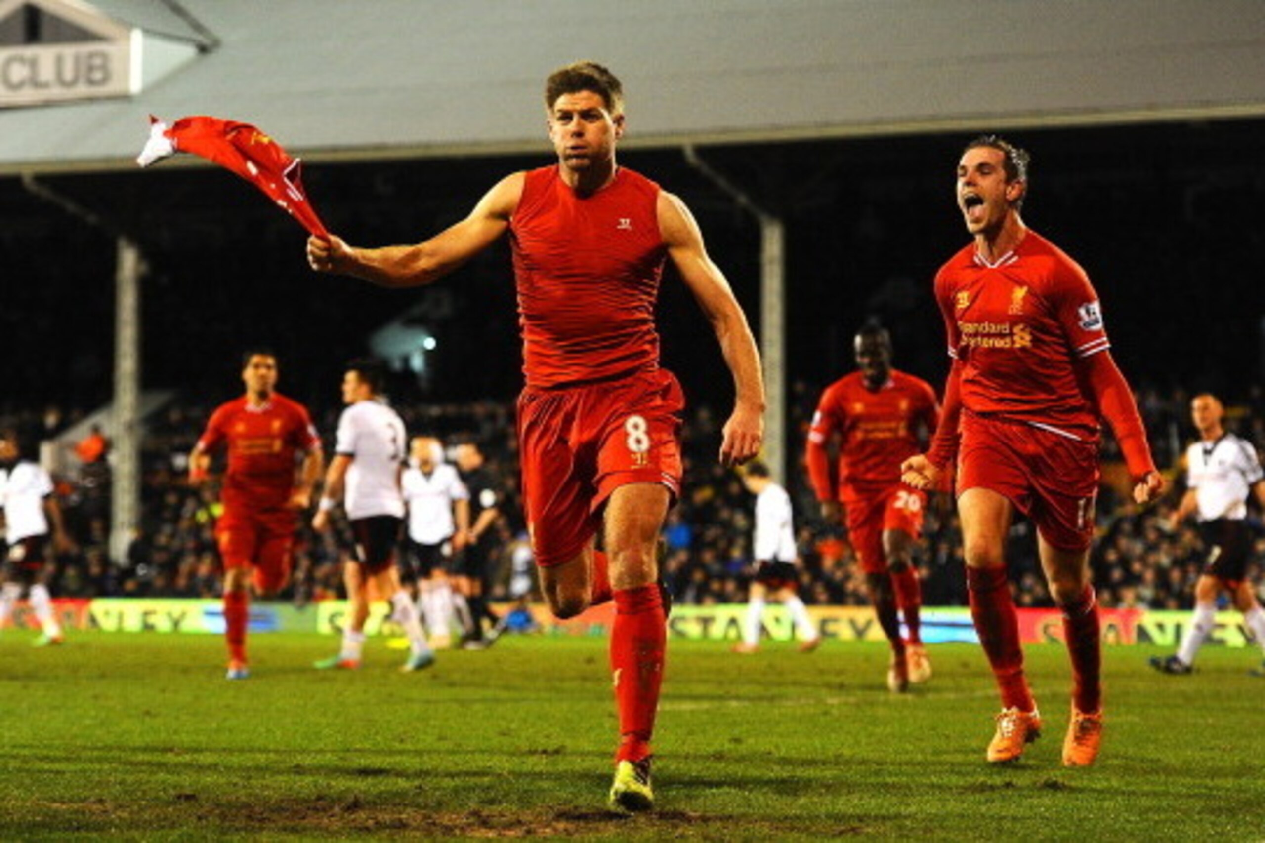 LONDON, ENGLAND - FEBRUARY 12:  Steven Gerrard of Liverpool celebrates scoring their third goal from the penalty spot during the Barclays Premier League match between Fulham and Liverpool at Craven Cottage on February 12, 2014 in London, England.  (Photo 