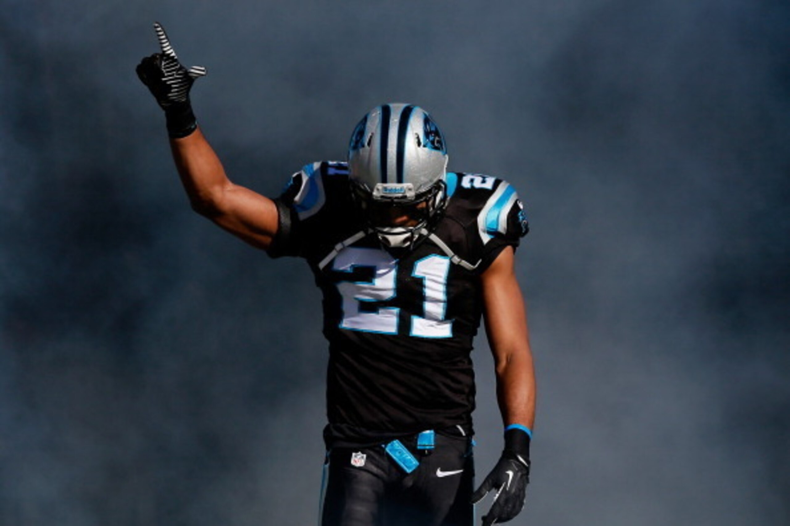 CHARLOTTE, NC - JANUARY 12:  Mike Mitchell #21 of the Carolina Panthers runs onto the field during player introductions against the San Francisco 49ers during the NFC Divisional Playoff Game at Bank of America Stadium on January 12, 2014 in Charlotte, Nor