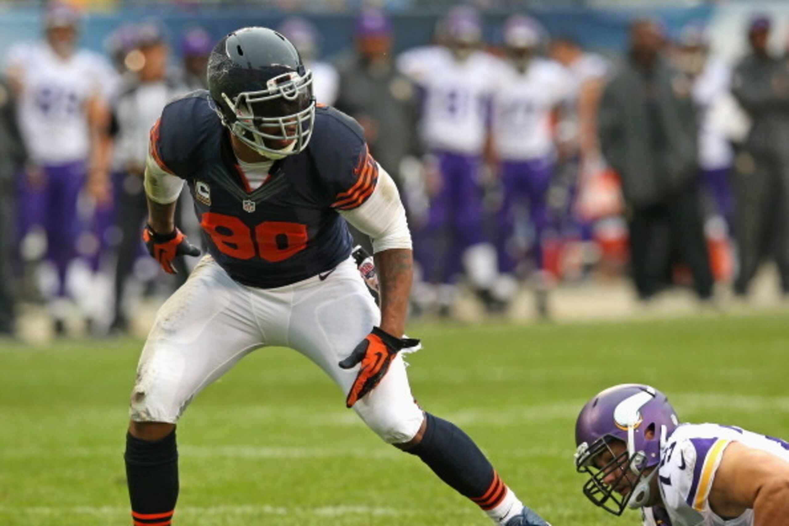 CHICAGO, IL - SEPTEMBER 15:  Julius Peppers #90 of the Chicago Bears moves past Matt Kalil #75 of the Minnesota Vikings at Soldier Field on September 15, 2013 in Chicago, Illinois. The Bears defeated the Vikings 31-30.  (Photo by Jonathan Daniel/Getty Ima