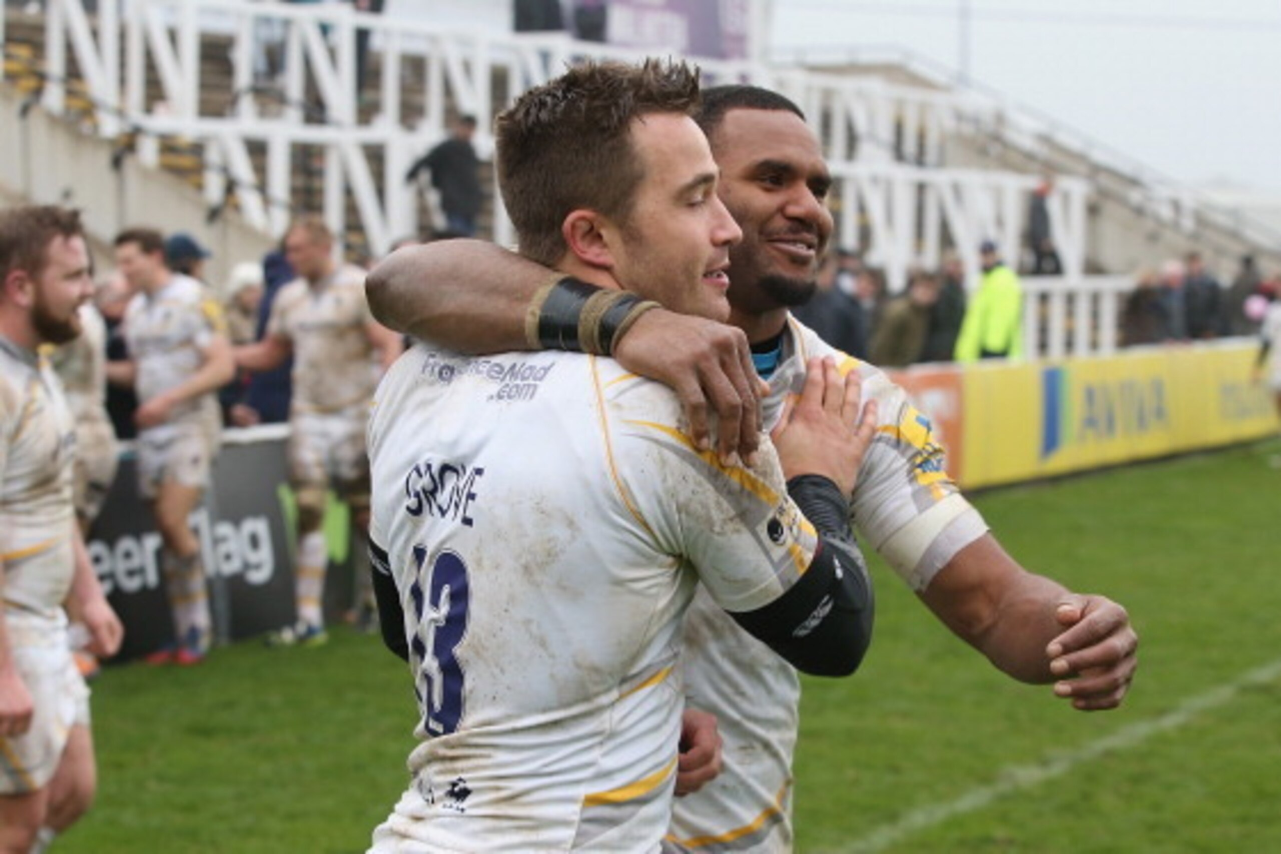 NEWCASTLE UPON TYNE, ENGLAND - MARCH 30:  Josh Drauniniu (R), who scored the match winning try  celebrates with team mate Alex Grove after Worcester secure their first victory of the season during the Aviva Premiership match between Newcastle Falcons and 