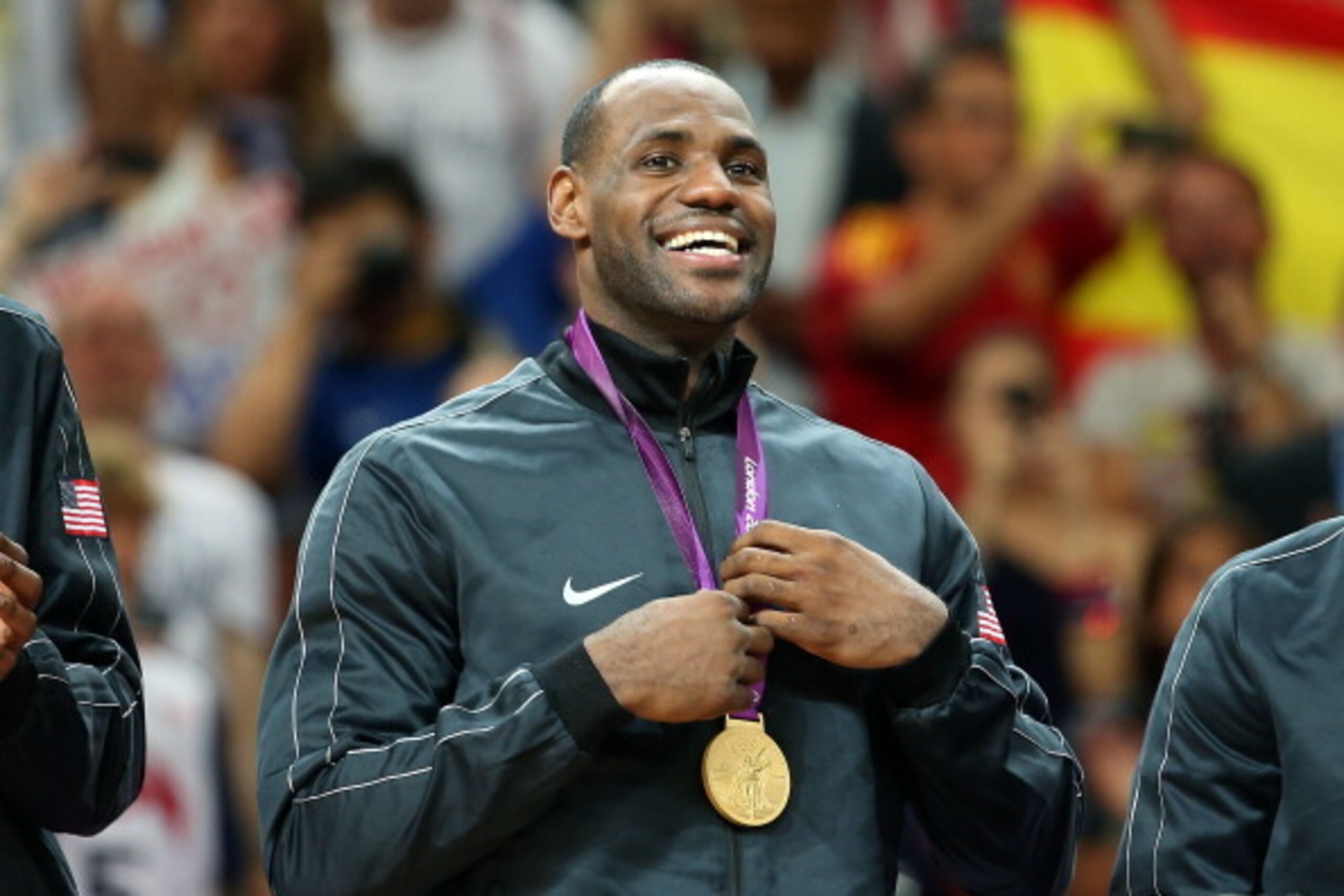 LONDON, ENGLAND - AUGUST 12:  Lebron James #6 of United States holds his gold medal after defeating Spain in the Men's Basketball gold medal game on Day 16 of the London 2012 Olympics Games at North Greenwich Arena on August 12, 2012 in London, England.  