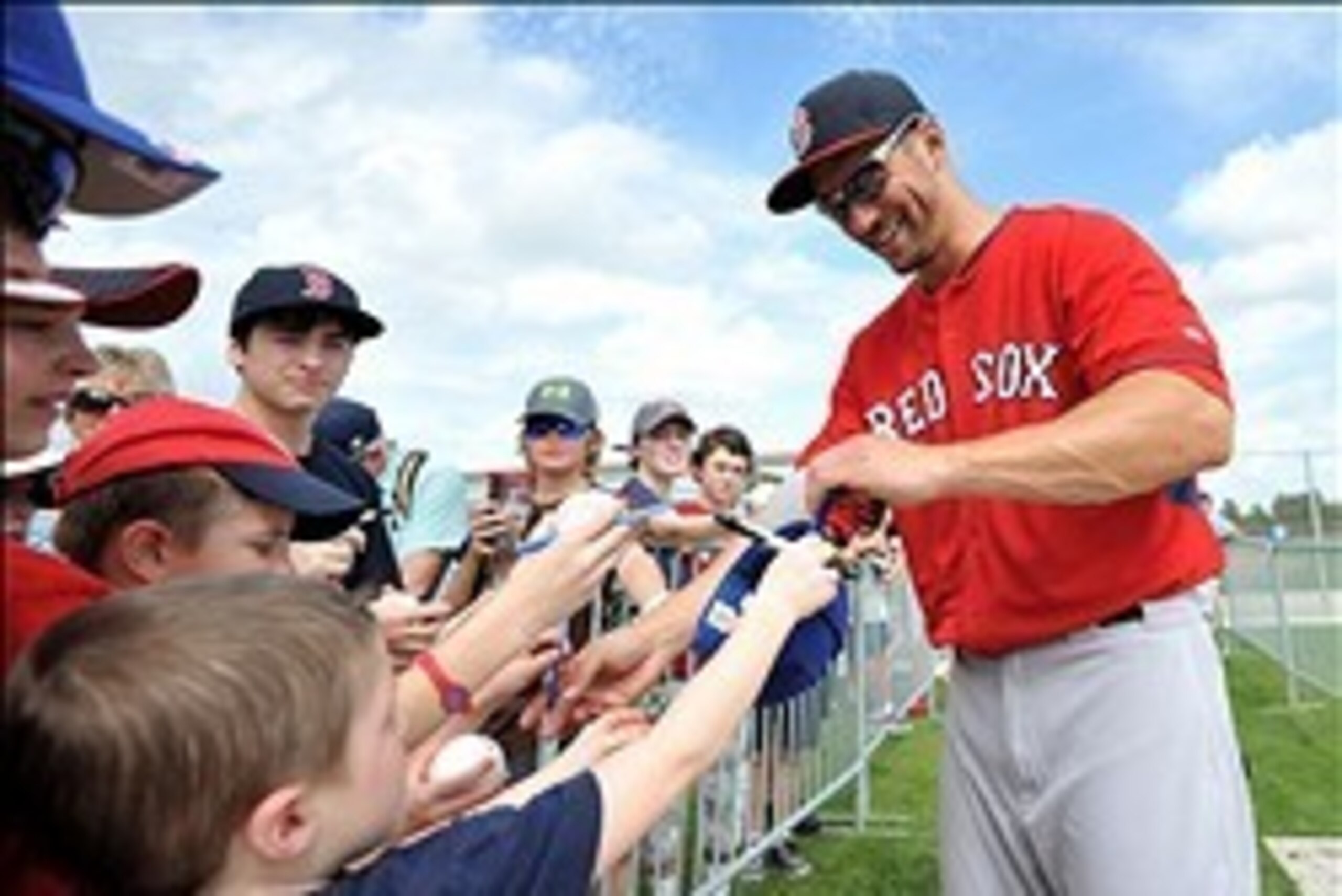 Feb 21, 2014; Ft Myers, FL, USA; Boston Red Sox outfielder Grady Sizemore (38) signs autographs during spring training at JetBlue Park. Mandatory Credit: Steve Mitchell-USA TODAY Sports