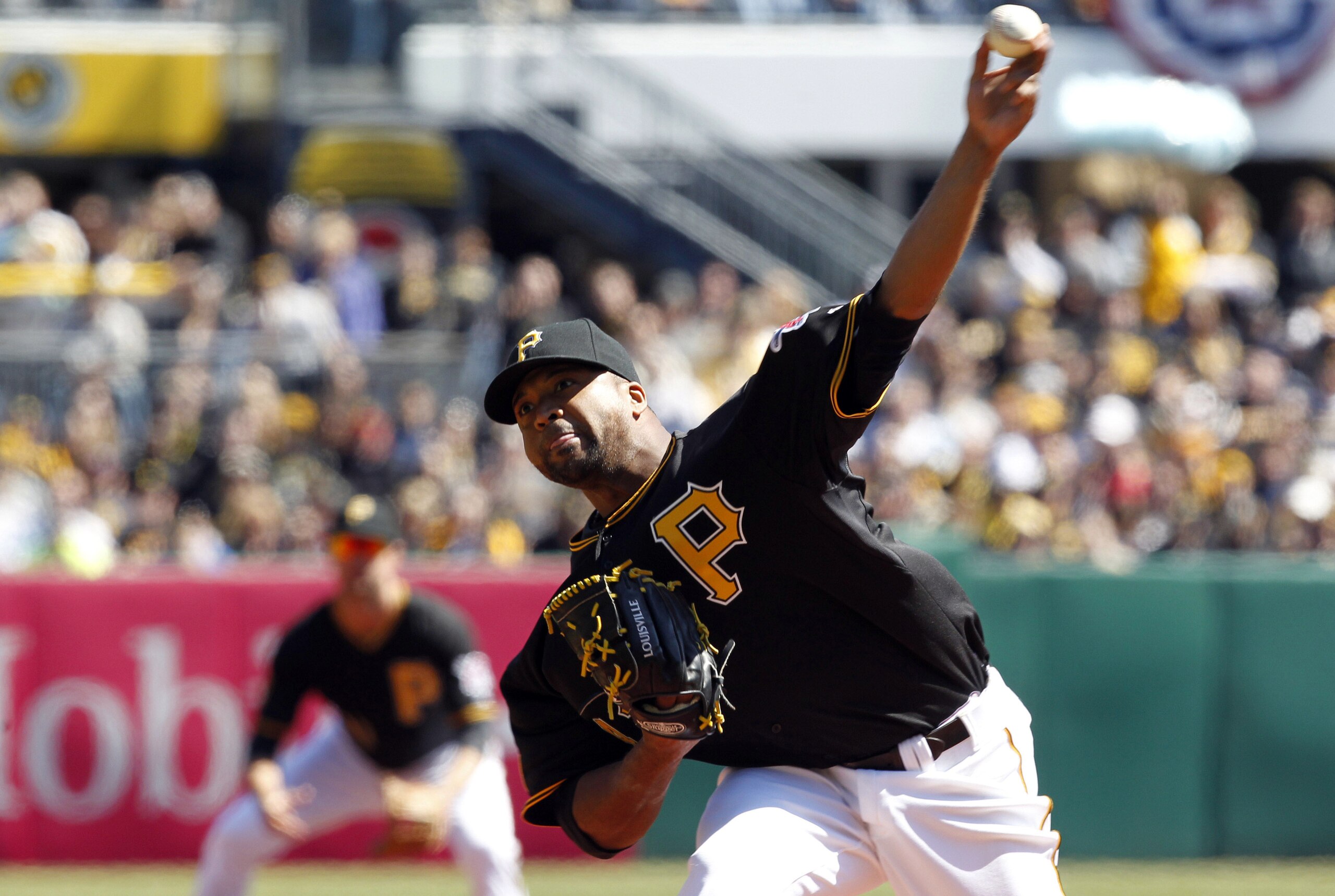 Mar 31, 2014; Pittsburgh, PA, USA; Pittsburgh Pirates starting pitcher Francisco Liriano (47) delivers a pitch against the Chicago Cubs during the first inning of an opening day baseball game at PNC Park. Mandatory Credit: Charles LeClaire-USA TODAY Sport