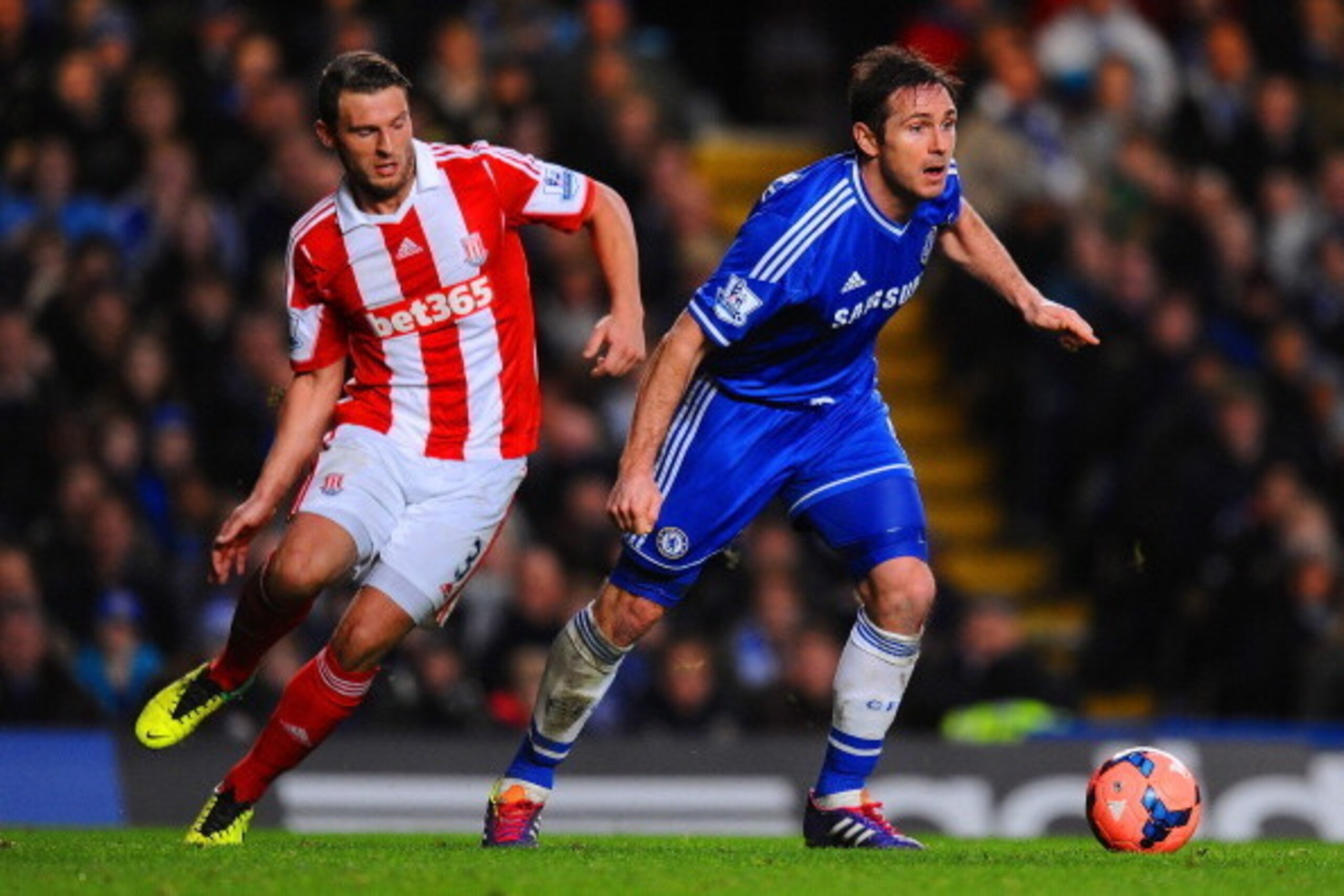 LONDON, ENGLAND - JANUARY 26: Erik Pieters of Stoke City closes down Frank Lampard of Chelsea  during the FA Cup Fourth Round between Chelsea and Stoke City at Stamford Bridge on January 26, 2014 in London, England.  (Photo by Mike Hewitt/Getty Images)