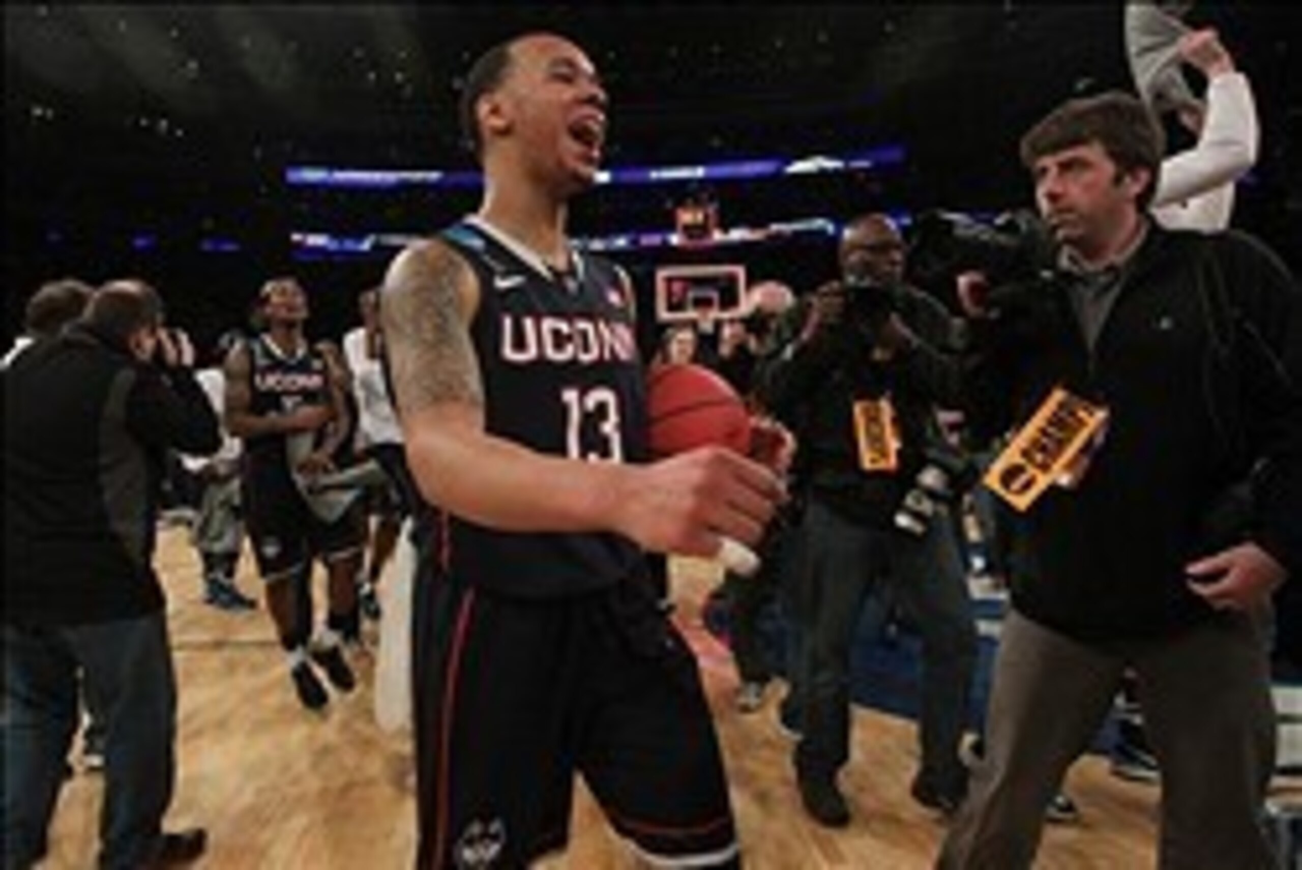 Mar 30, 2014; New York, NY, USA; Connecticut Huskies guard Shabazz Napier (13) celebrates after beating the Michigan State Spartans in the finals of the east regional of the 2014 NCAA Mens Basketball Championship tournament at Madison Square Garden. Manda