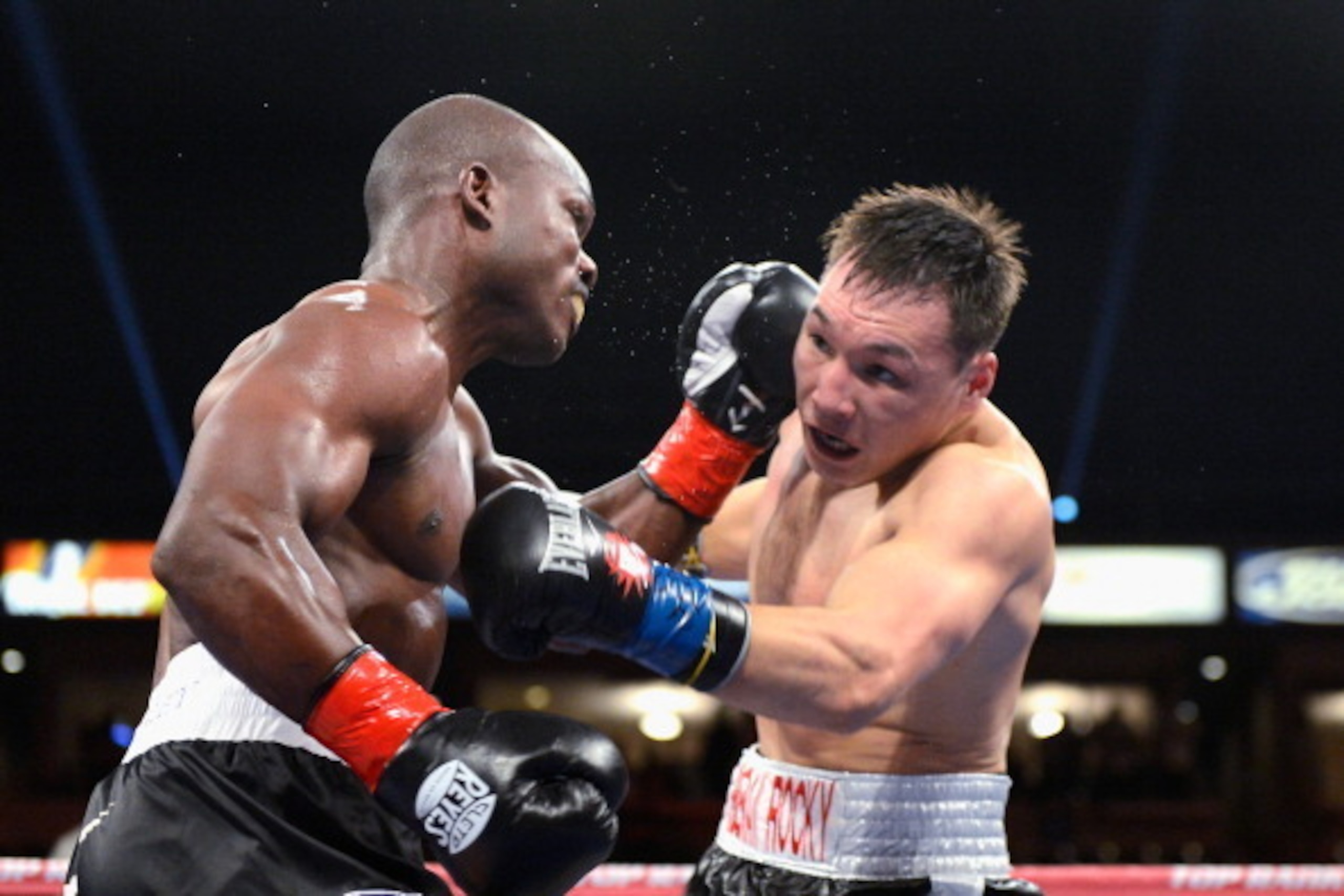 CARSON, CA - MARCH 16:  WBO Welterweight Champion Timothy Bradley (L) lands a punch against contender Ruslan Provodnikov during their WBO Welterweight Championship boxing match at The Home Depot Center on March 16, 2013 in Carson, California.  Bradley ret