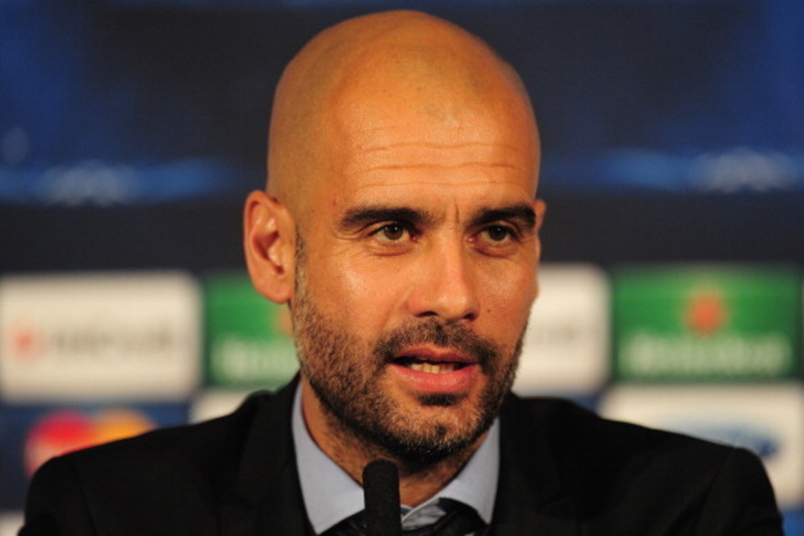 LONDON, ENGLAND - FEBRUARY 18:  FC Bayern Muenchen coach Pep Guardiola talks to the media during a press conference at the Landmark Hotel on February 18, 2014 in London, England.  (Photo by Shaun Botterill/Getty Images)