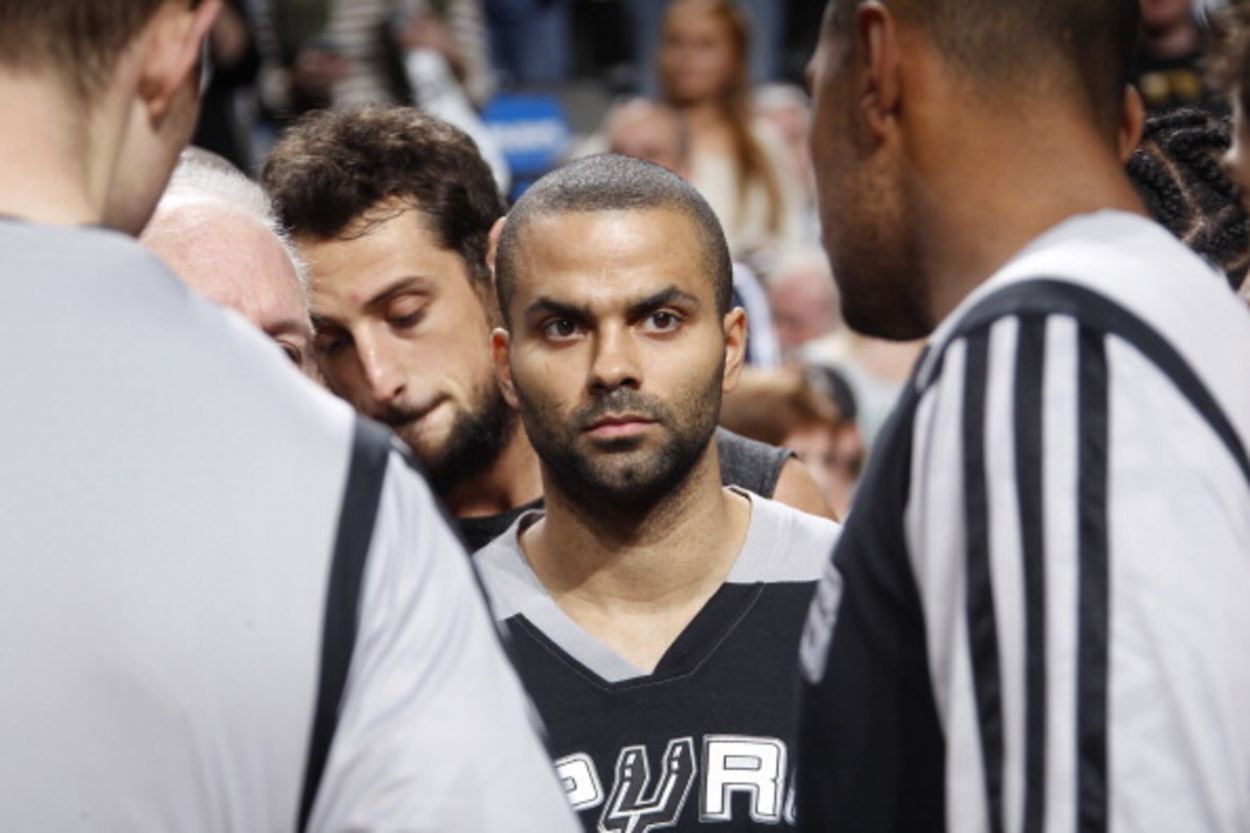 DALLAS, TX - DECEMBER 26:  Tony Parker #9 of the San Antonio Spurs huddles up before the game against the Dallas Mavericks on December 26, 2013 at the American Airlines Center in Dallas, Texas. NOTE TO USER: User expressly acknowledges and agrees that, by