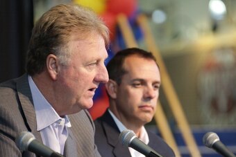 INDIANAPOLIS - SEPTEMBER 25:  Larry Bird the team president and Frank Vogel the head coach of the Indiana Pacers speak during a press conference about Paul George's contract extension at Bankers Life Fieldhouse on September 25, 2013 in Indianapolis, India