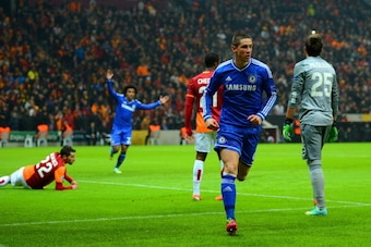 ISTANBUL, TURKEY - FEBRUARY 26: Fernando Torres of Chelsea turns to celebrate scoring the opening goal during the UEFA Champions League Round of 16 first leg match between Galatasaray AS and Chelsea at Ali Sami Yen Arena on February 26, 2014 in Istanbul, 