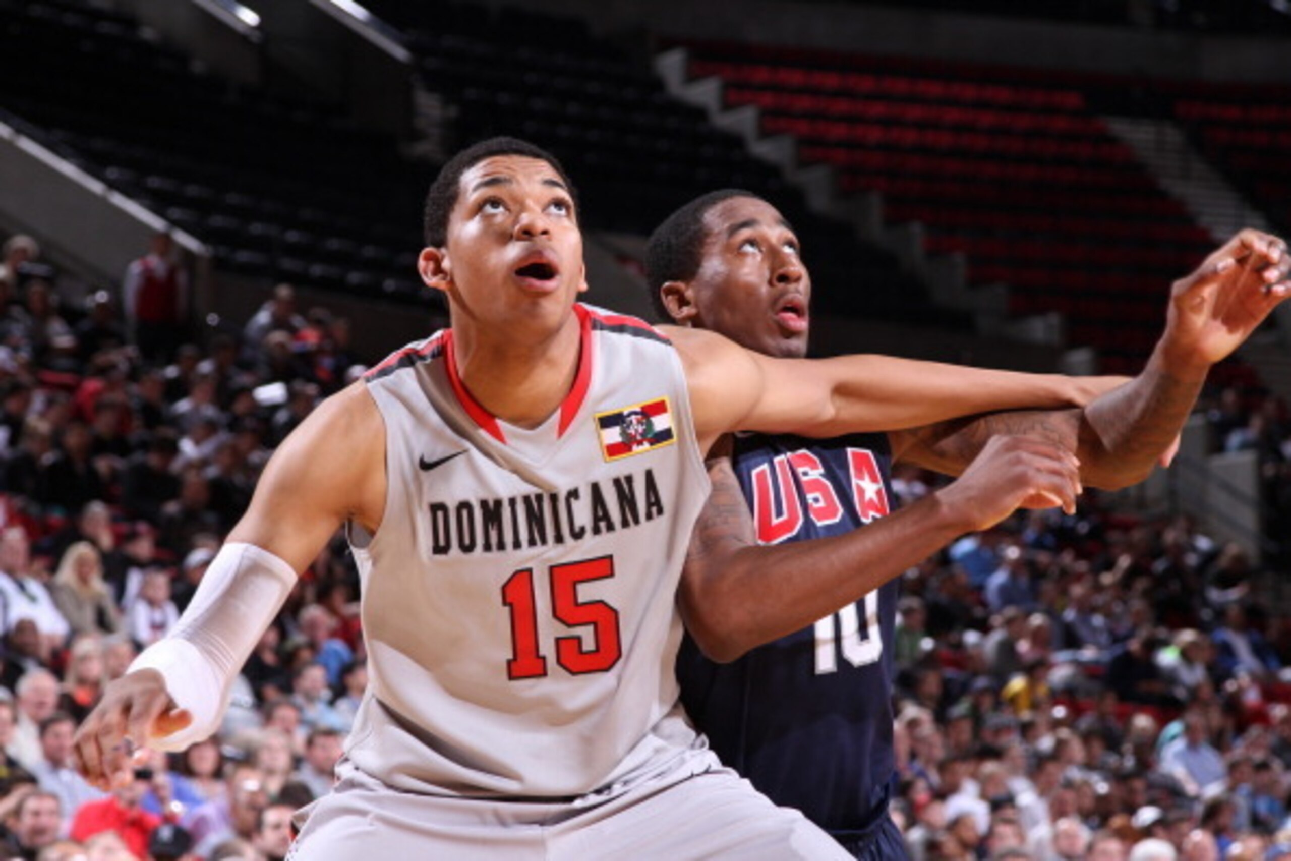 PORTLAND, OR - APRIL 20: Karl Towns Jr. #15 of the World Select Team battles for positioning against Rondae Hollis-Jefferson #10 of the USA Junior Select Team during the 2013 Nike Hoop Summit game on April 20, 2013 at the Rose Garden Arena in Portland, Or