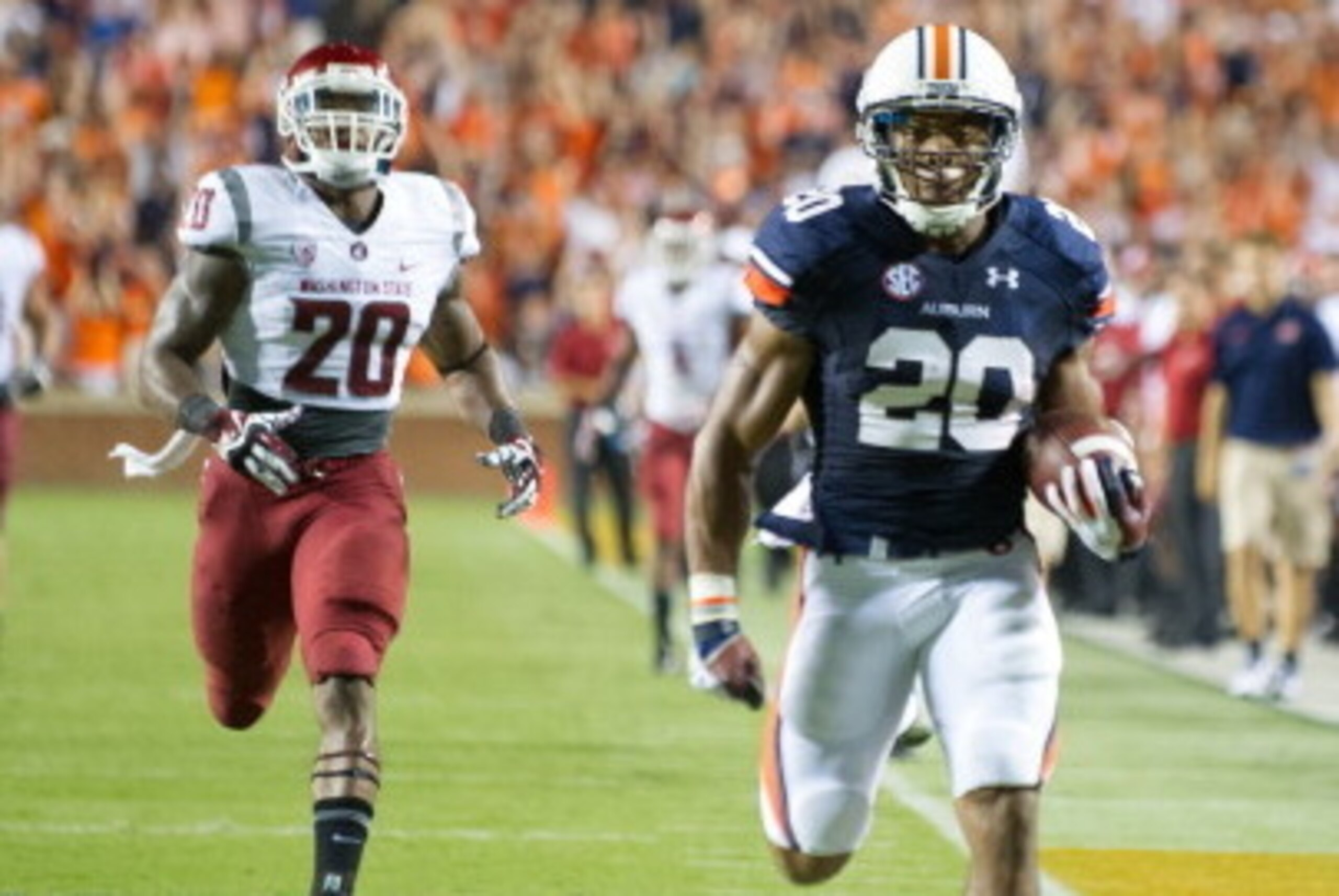 AUBURN, AL - AUGUST 31:  Running back Corey Grant #20 of the Auburn Tigers runs the ball in for a touchdown during the first half of play on August 31, 2013 at Jordan-Hare Stadium in Auburn, Alabama. At halftime Auburn leads Washington State 25-21.  (Phot