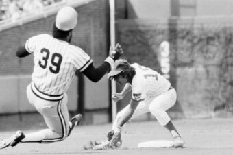 Parker heads into second base, against Manny Trillo, in 1978.