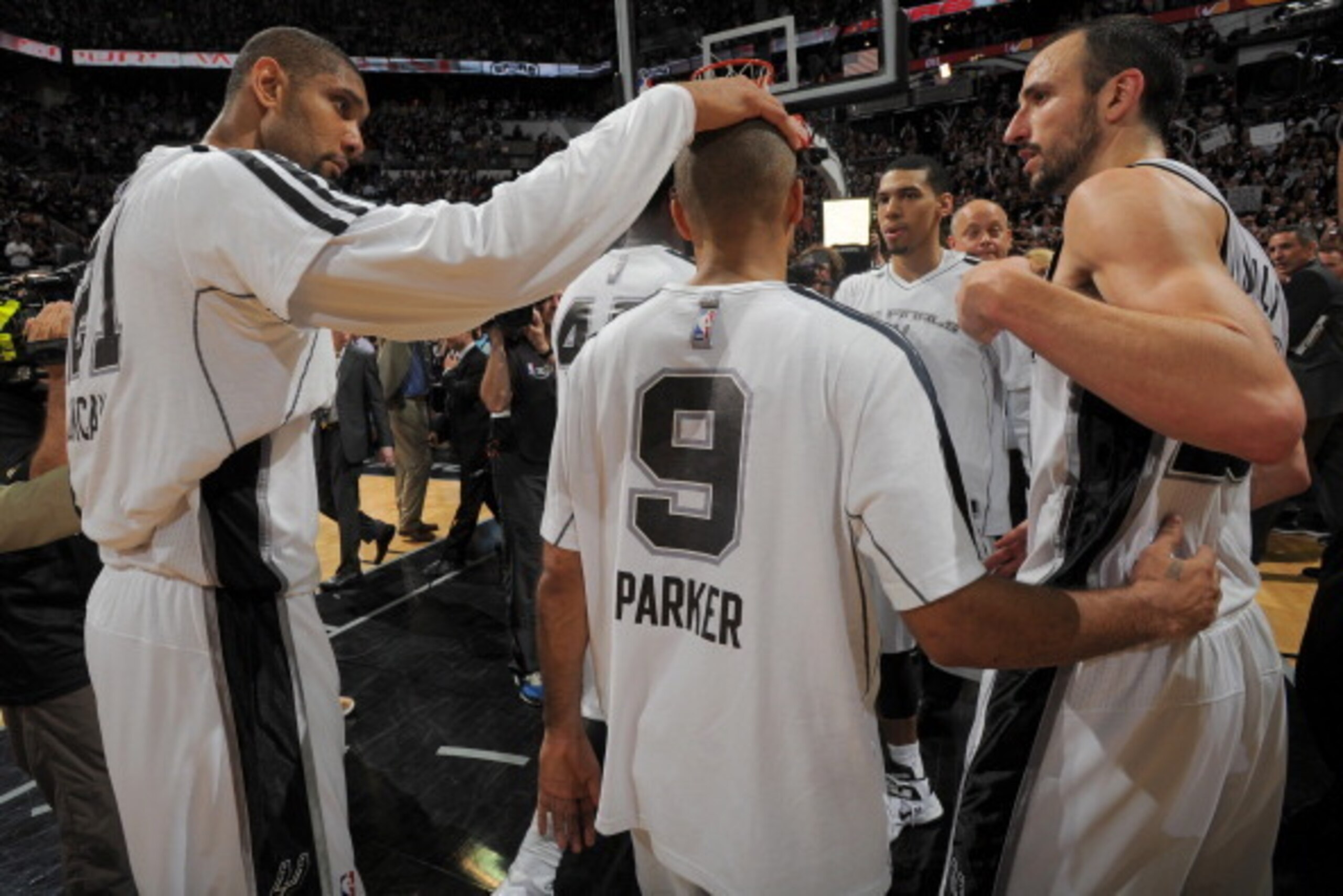 SAN ANTONIO, TX - JUNE 16: Tim Duncan #21, Tony Parker #9 and Manu Ginobili #20 of the San Antonio Spurs celebrate after the Spurs' Game Five victory over the Miami Heat in the 2013 NBA Finals on June 16, 2013 at the AT&T Center in San Antonio, Texas. NOT