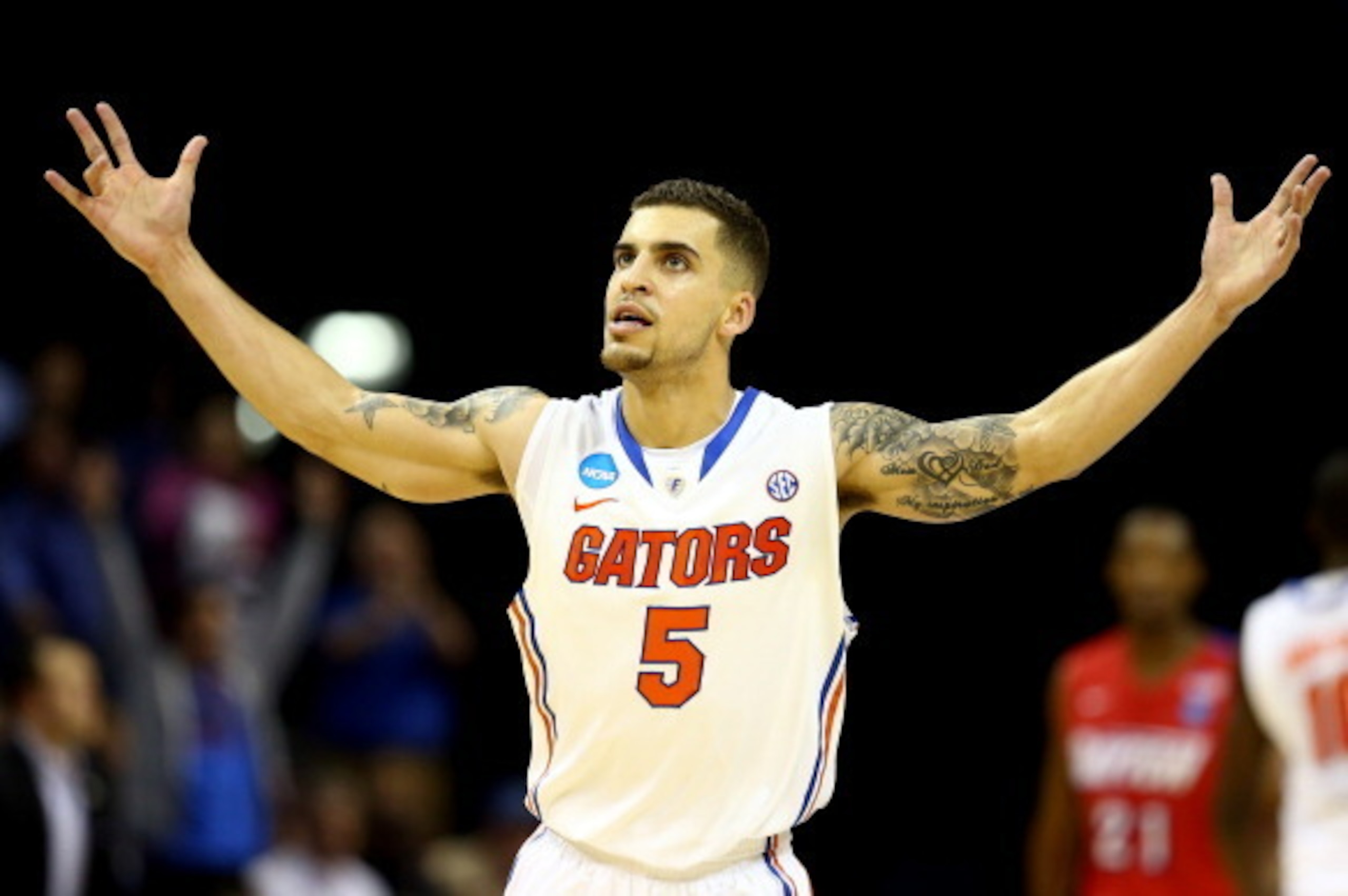 MEMPHIS, TN - MARCH 29:  Scottie Wilbekin #5 of the Florida Gators celebrates after hitting a three pointer to end the first half against the Dayton Flyers during the south regional final of the 2014 NCAA Men's Basketball Tournament at the FedExForum on M