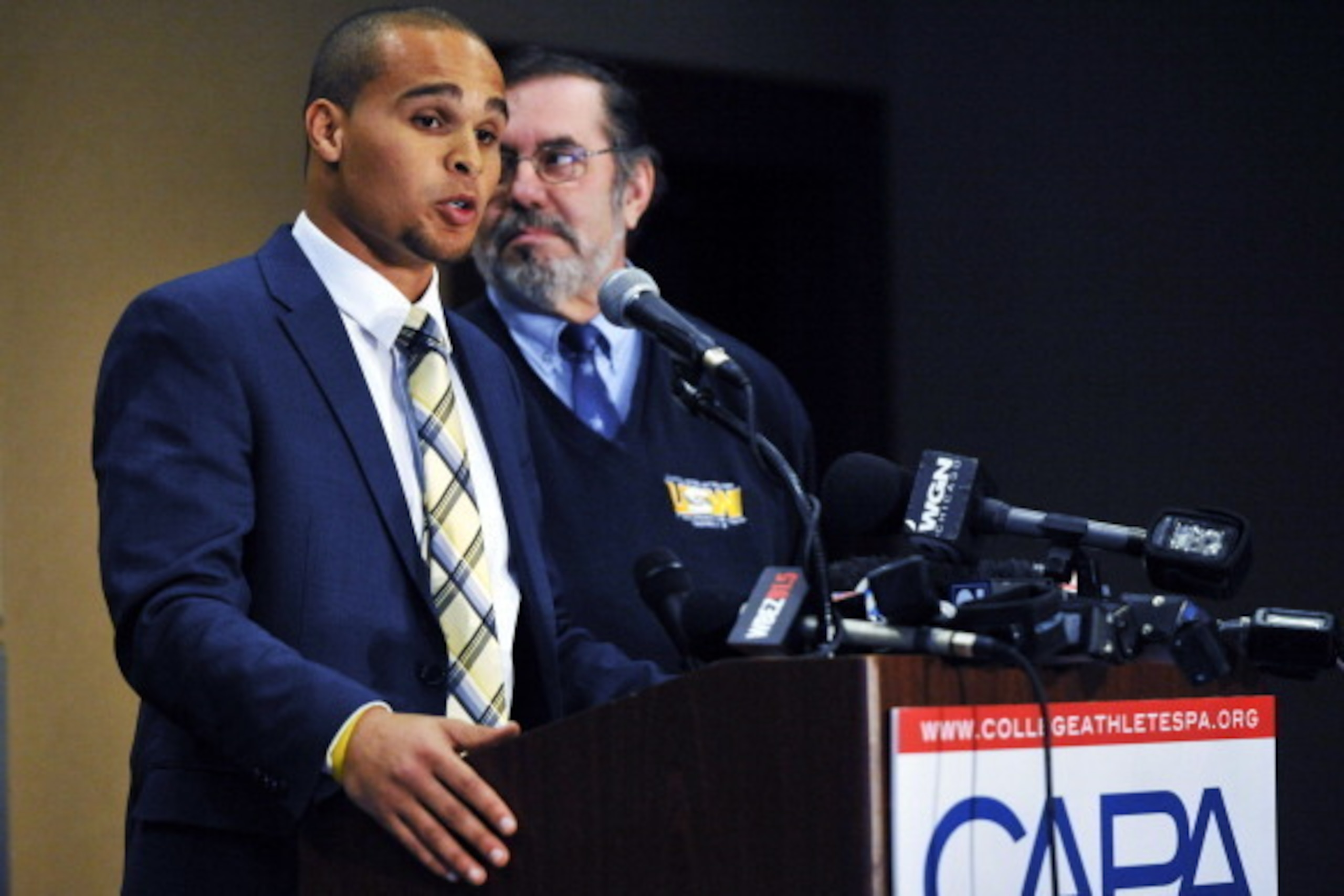 CHICAGO IL - JANUARY 28:  Leo W. Gerard, President of the Steelworkers, (R) and Northwestern quarterback Kain Colter answer questions at a press conference on January 28 2014 at  The Hyatt Regency Hotel in Chicago Illinois. Citing what they deem as the NC