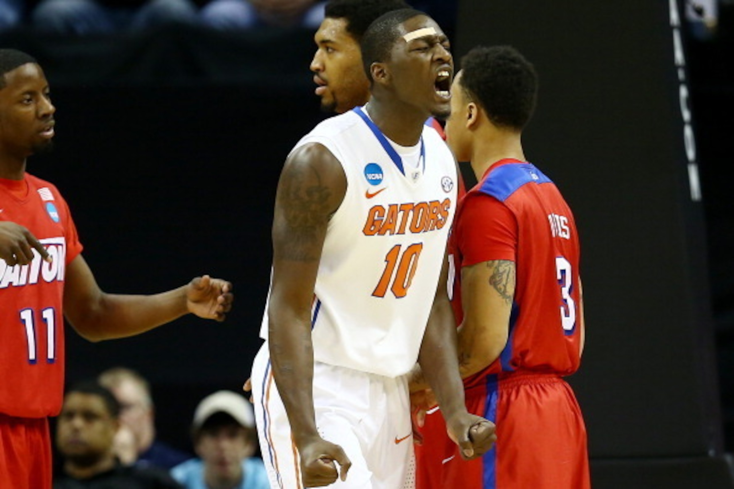 MEMPHIS, TN - MARCH 29: Dorian Finney-Smith #10 of the Florida Gators reacts against the Dayton Flyers  during the south regional final of the 2014 NCAA Men's Basketball Tournament at the FedExForum on March 29, 2014 in Memphis, Tennessee.  (Photo by Stre