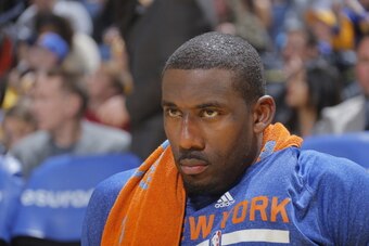 OAKLAND, CA - MARCH 30: Amare Stoudemire #1 of the New York Knicks watches from the sideline in a game against the Golden State Warriors on March 30, 2014 at Oracle Arena in Oakland, California. NOTE TO USER: User expressly acknowledges and agrees that, b