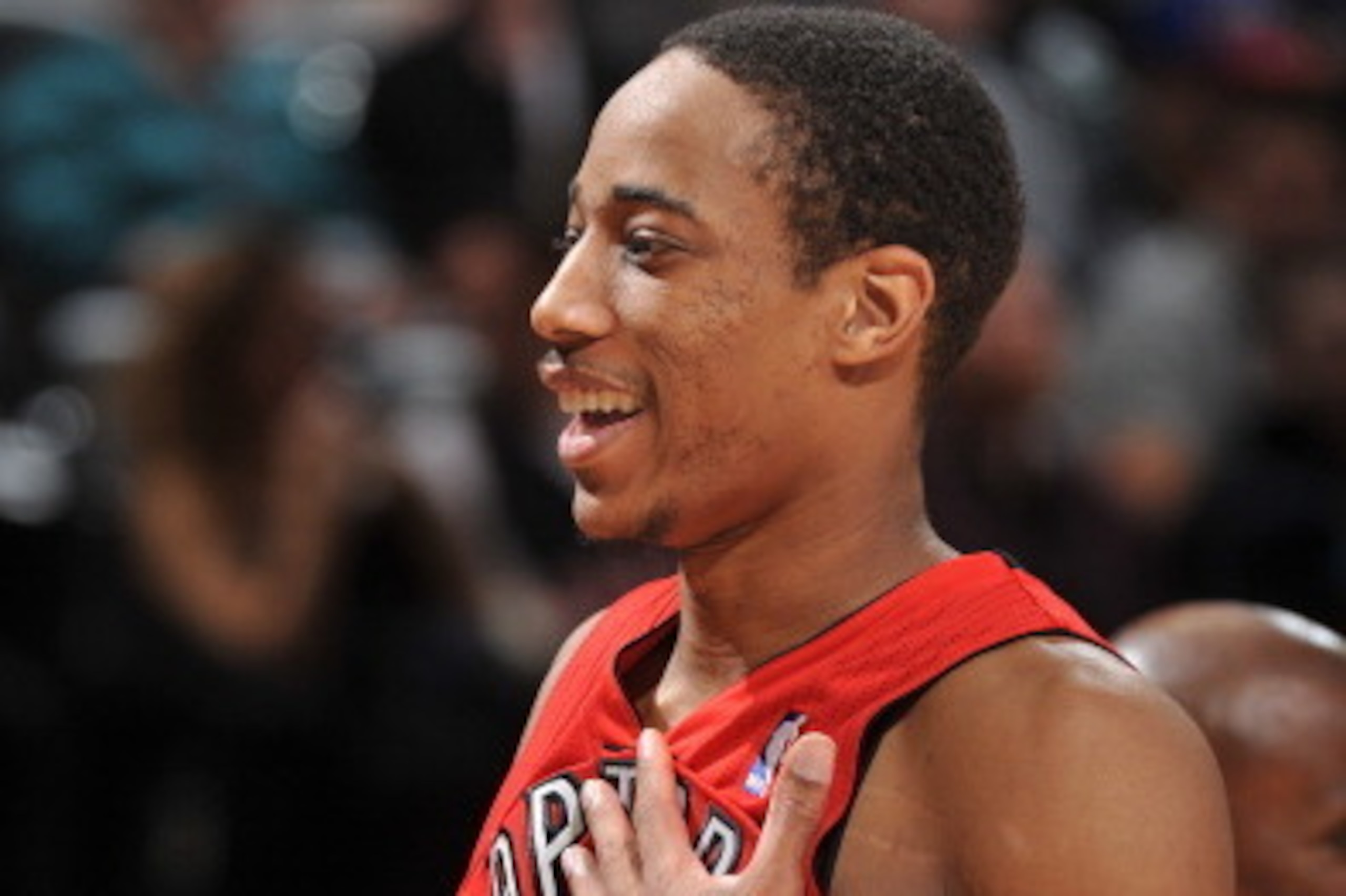 DENVER, CO - JANUARY 31: DeMar DeRozan #10 of the Toronto Raptors smiles during the game against the Denver Nuggets on January 31, 2014 at the Pepsi Center in Denver, Colorado. NOTE TO USER: User expressly acknowledges and agrees that, by downloading and/