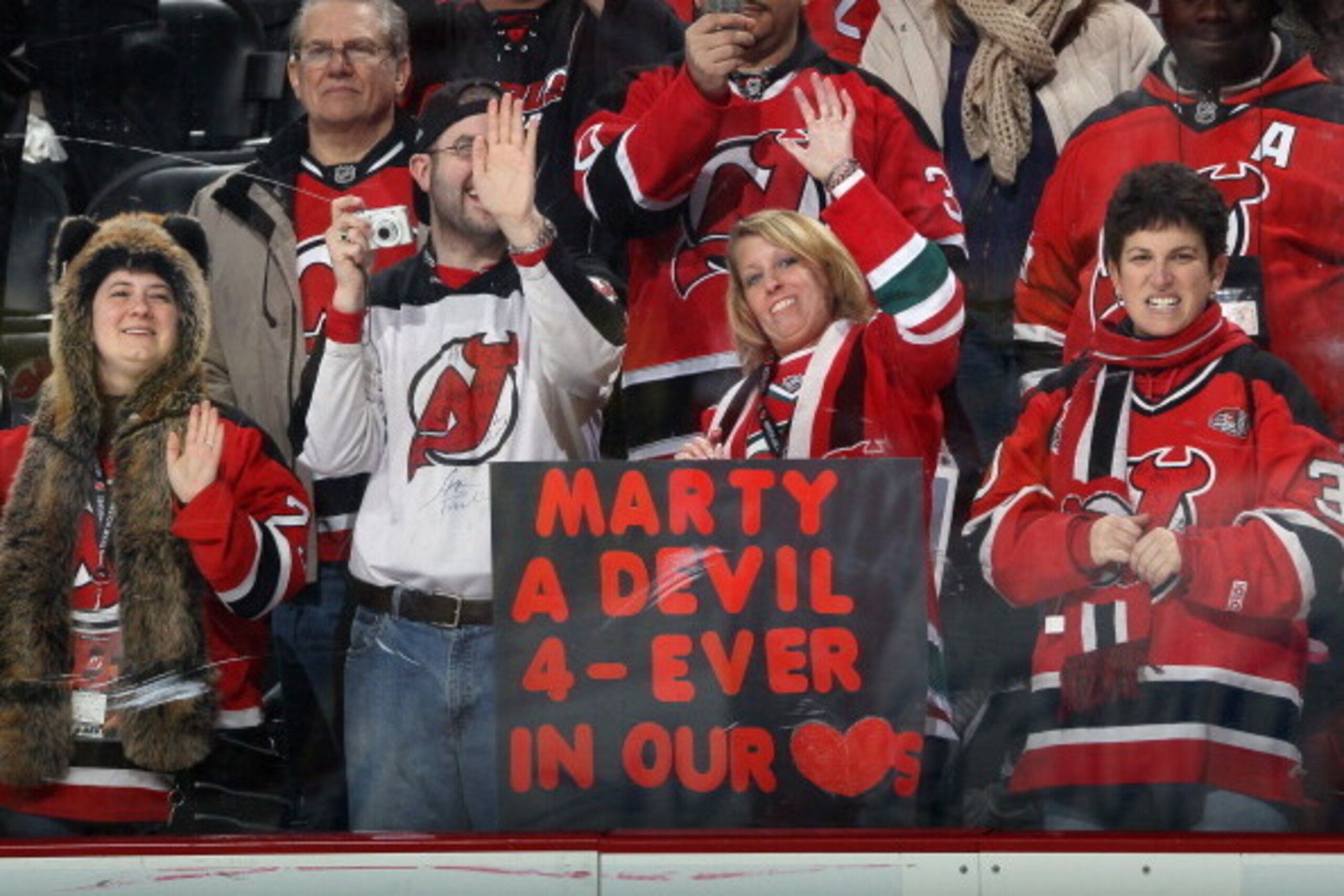 NEWARK, NJ - MARCH 04: Fans respond to rumors of an impending trade of goaltender Martin Brodeur #30 of the New Jersey Devils prior to the game against the Detroit Red Wings at the Prudential Center on March 4, 2014 in Newark, New Jersey.  (Photo by Bruce