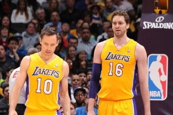 LOS ANGELES, CA - APRIL 1: Steve Nash #10 and Pau Gasol #16 of the Los Angeles Lakers look on during their game against the Portland Trail Blazers at Staples Center on April 1, 2014 in Los Angeles, California. NOTE TO USER: User expressly acknowledges and
